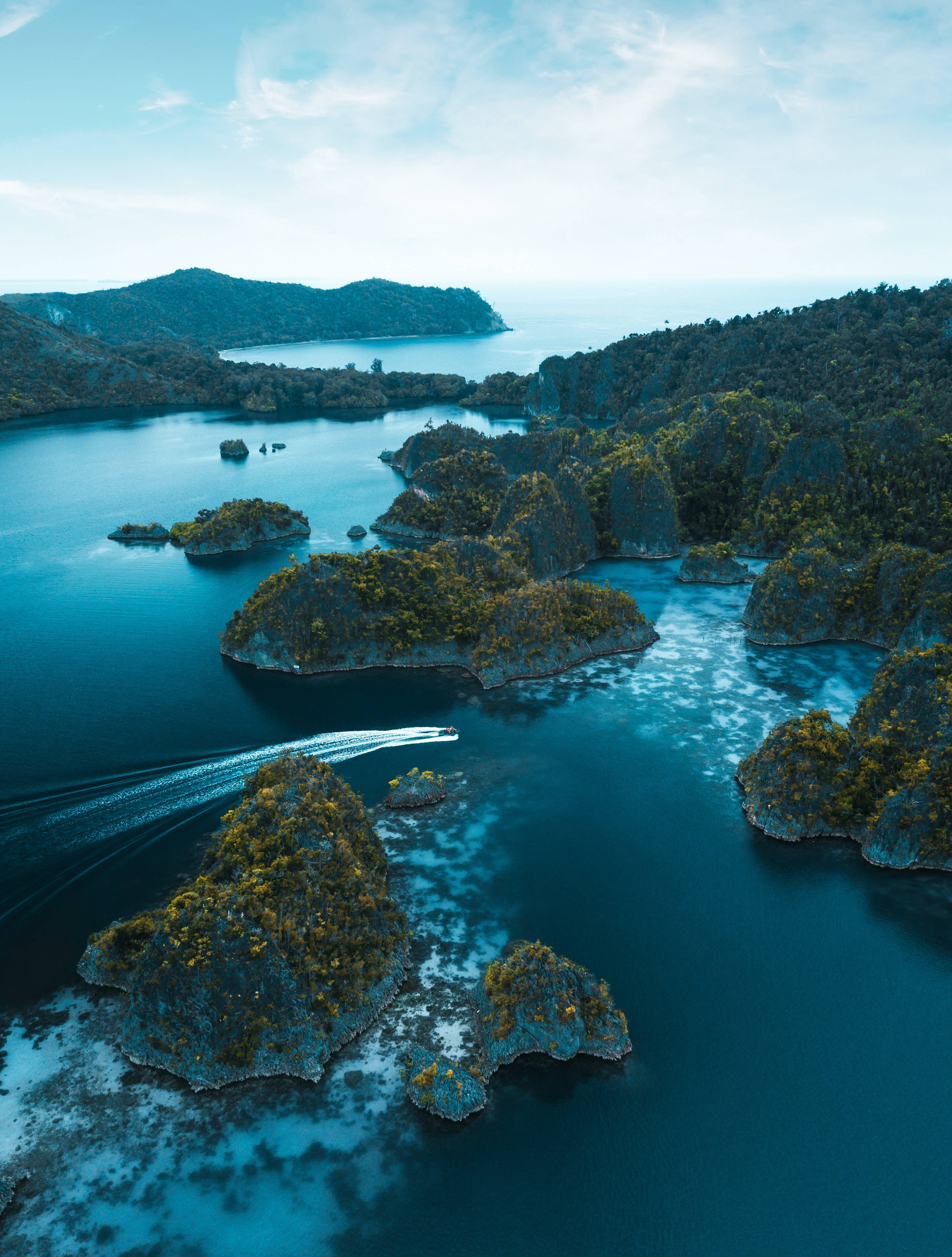 turquoise waters, lush green karst islands, speedboat, 2K Phone Wallpaper
