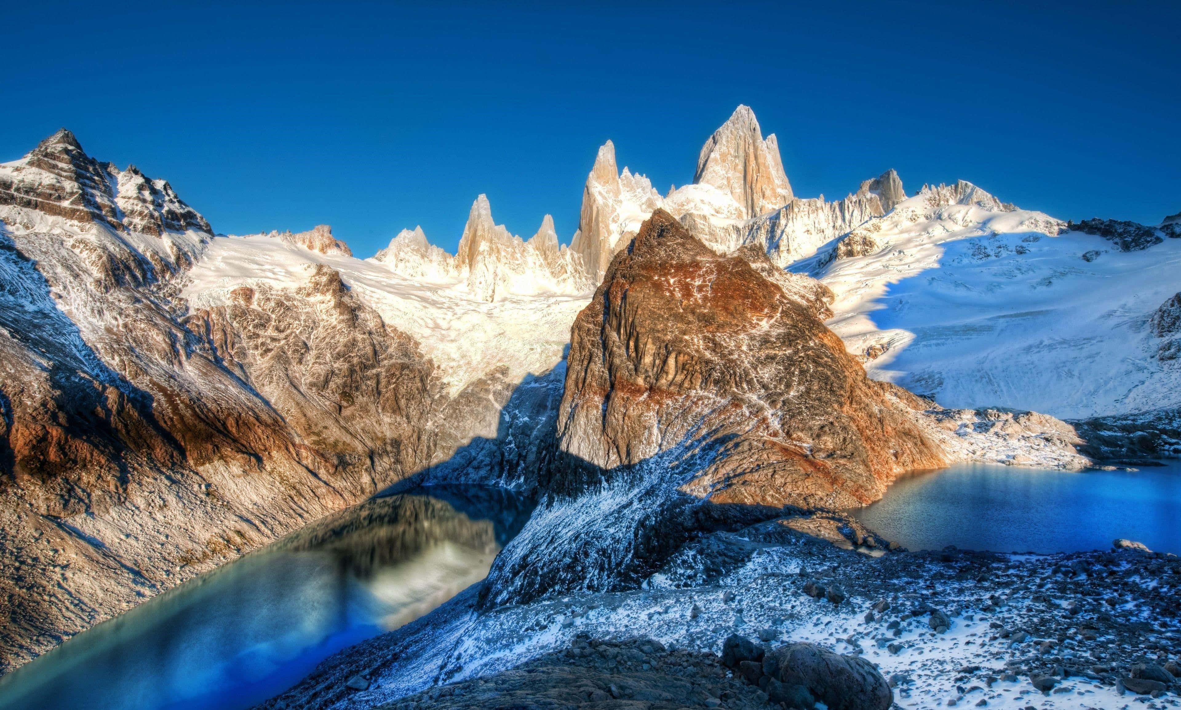 majestic mountain peaks, glacial lake, snowcapped jagged peaks, 4K Desktop Wallpaper