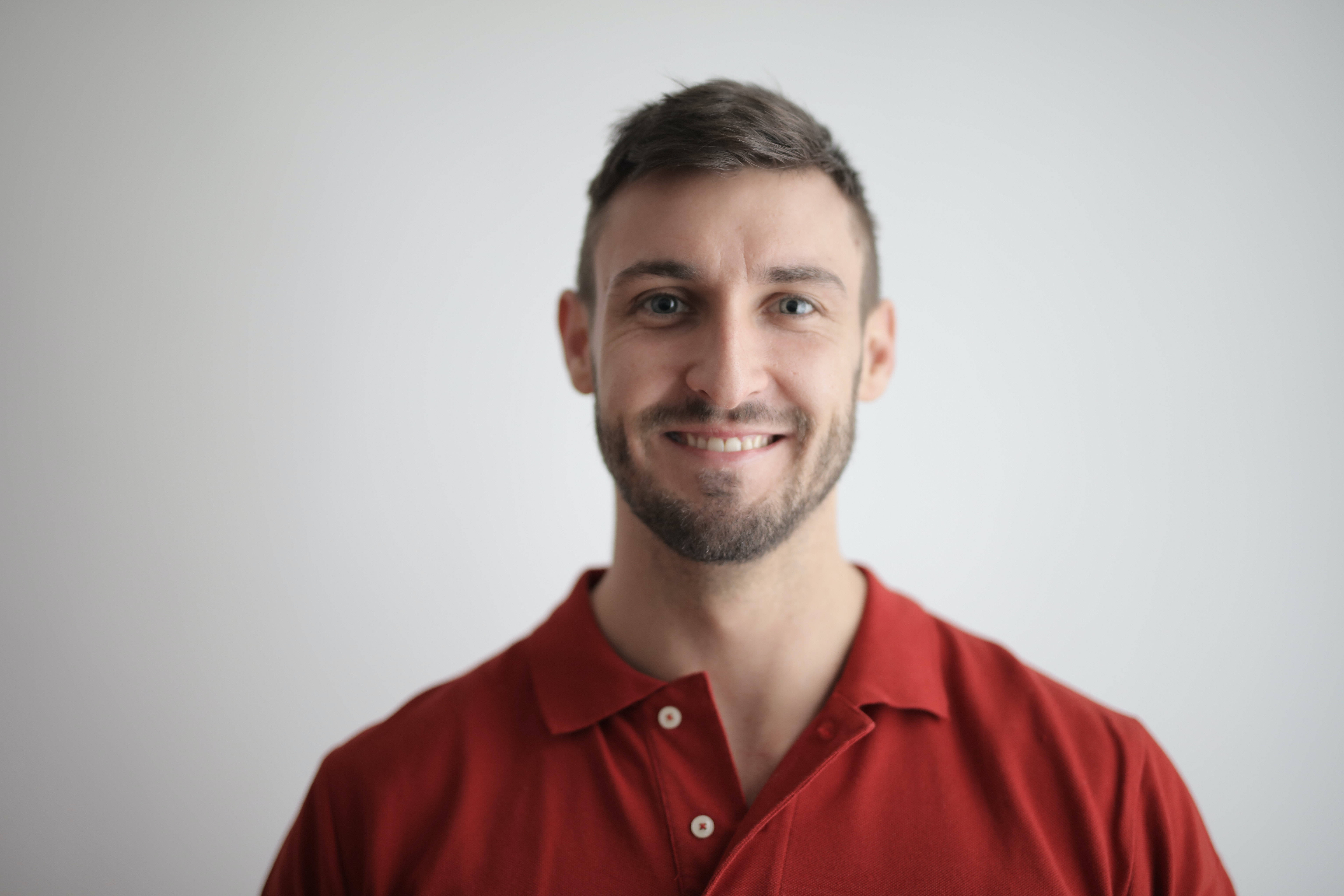 red polo shirt, short dark hair, beard, 8K Desktop Wallpaper