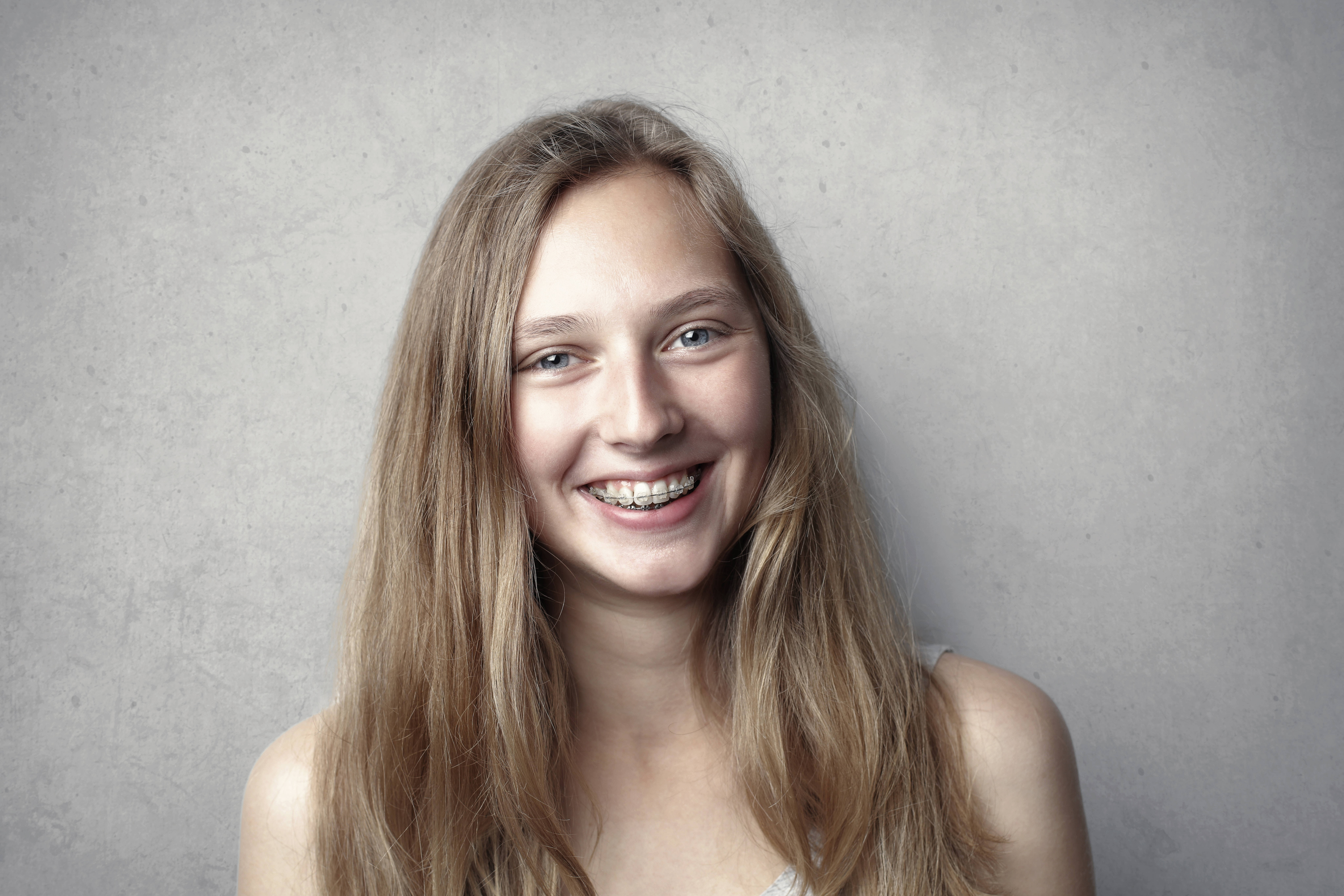 woman, long blonde hair, braces, 8K Desktop Wallpaper