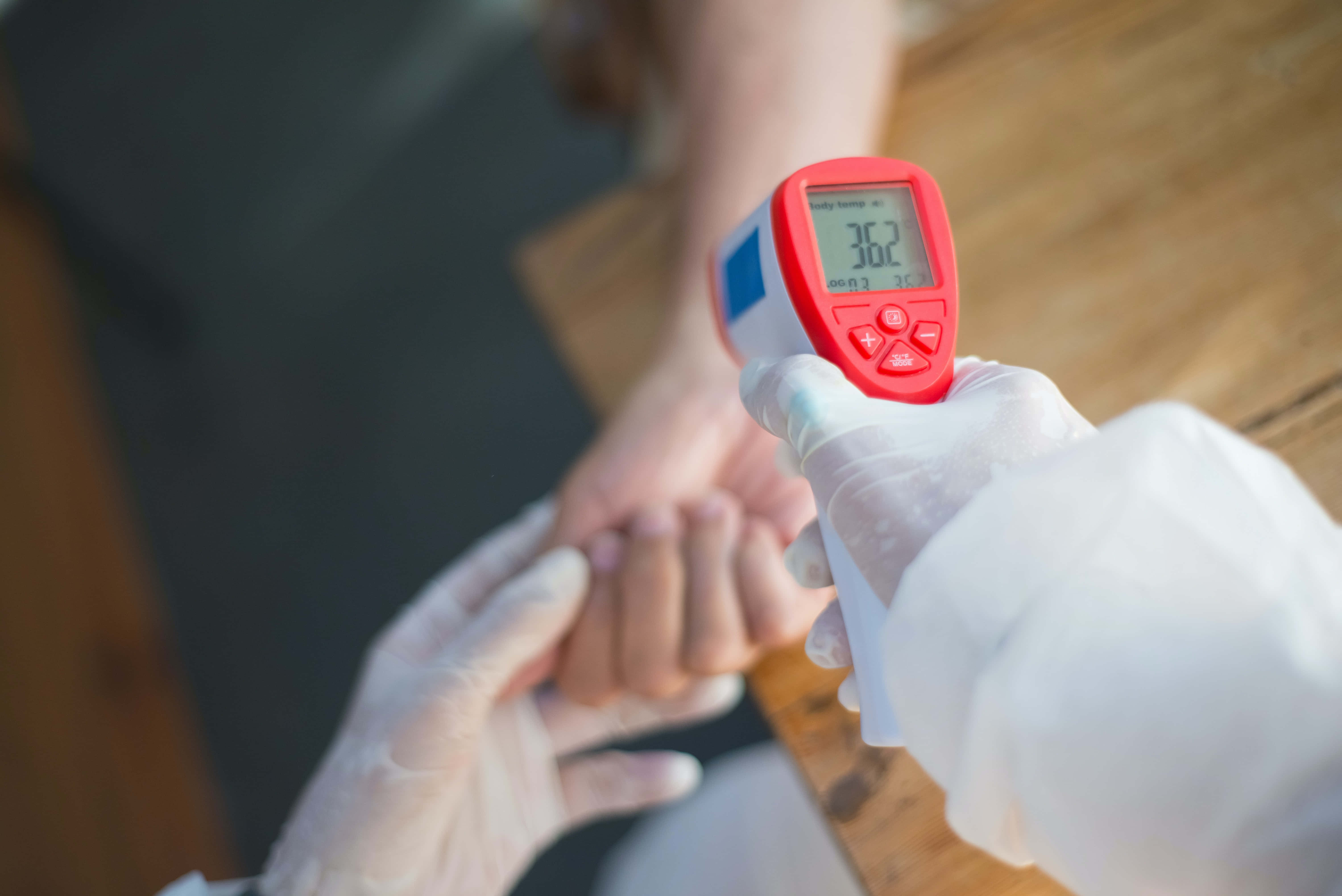 infrared thermometer, 36.2°C, wooden table, 5K Desktop Wallpaper