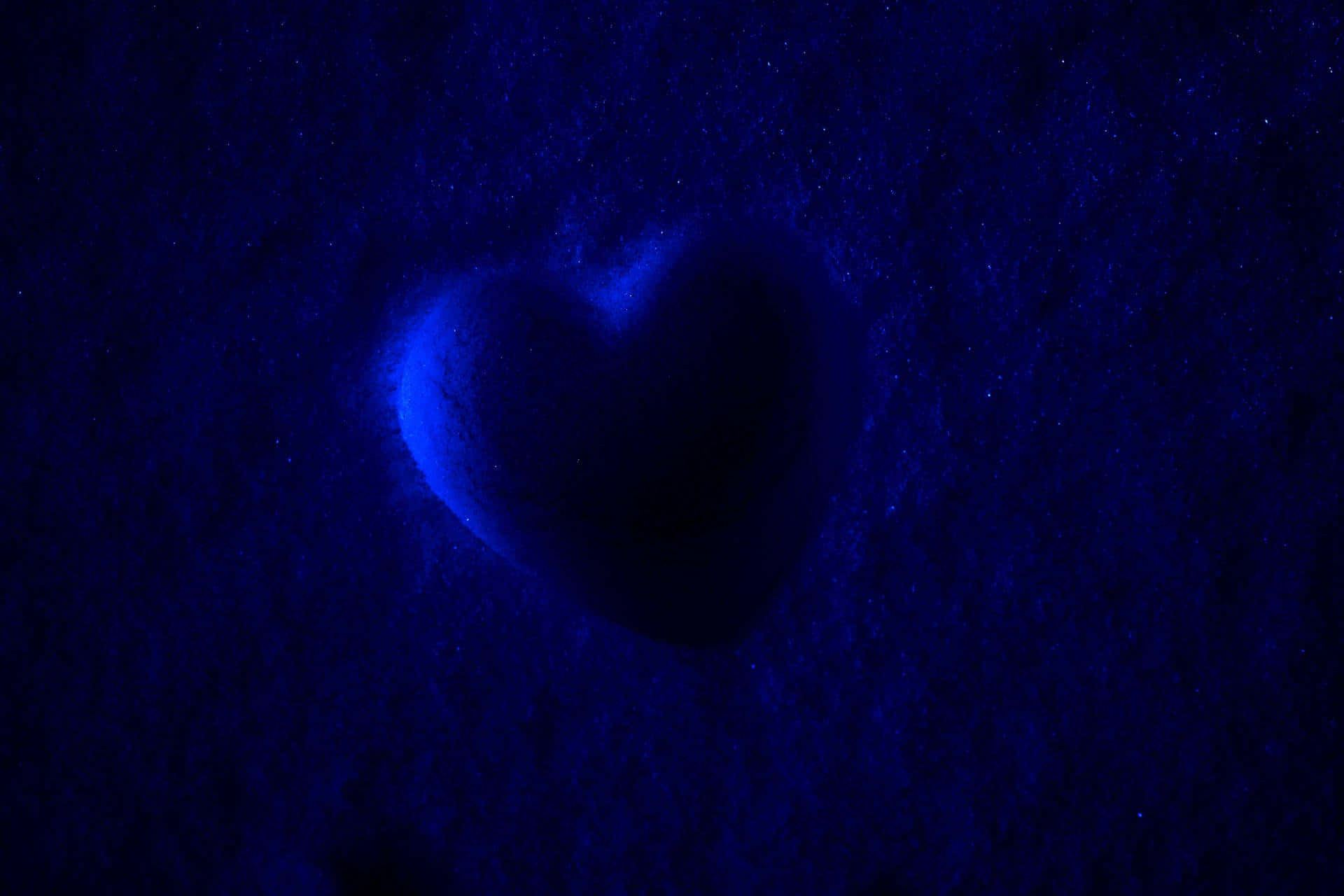 blue heart nebula texture, glowing blue heart shape, textured dark blue surface, Full HD Desktop Wallpaper