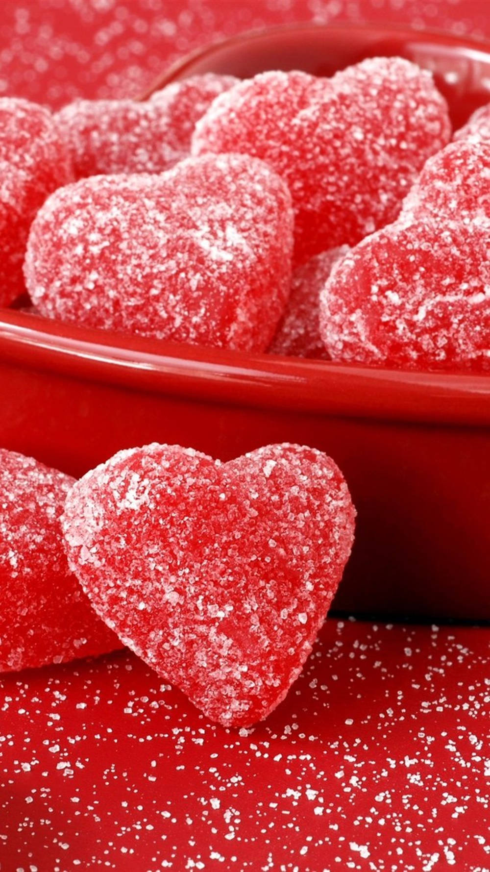 Heart iPhone, red heart-shaped candies, glossy red bowl, HD Phone Wallpaper