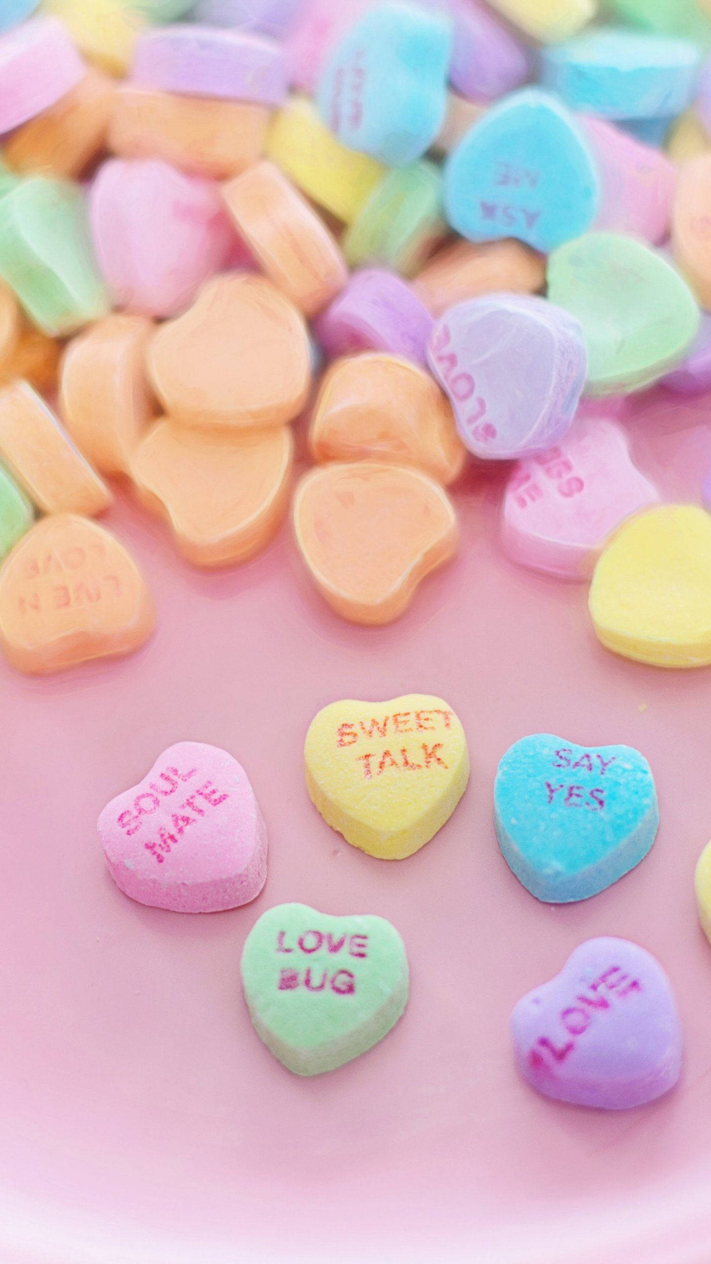 pastel heart, iPhone display, colorful heart-shaped candy, 2K Phone Wallpaper