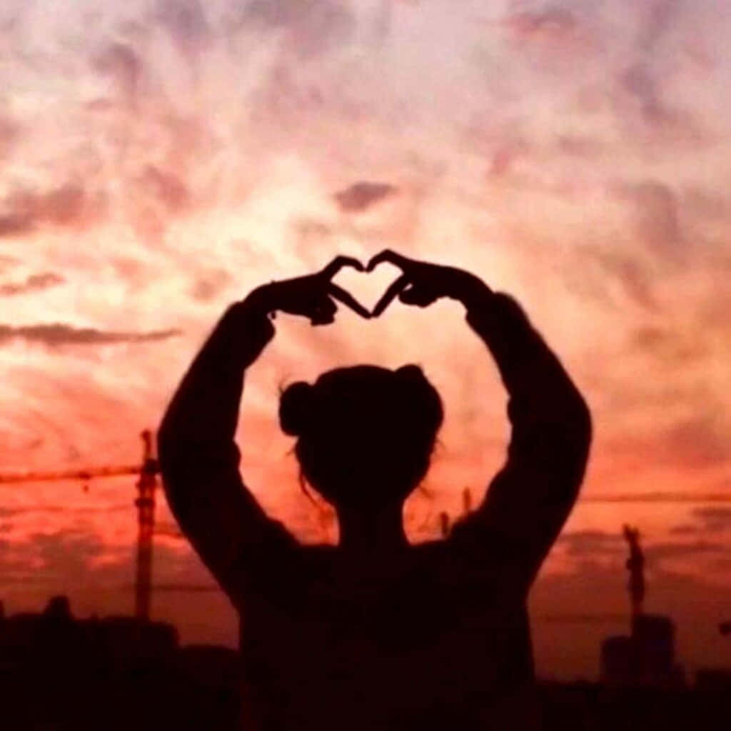 silhouette girl, heart, vibrant orange and pink sunset sky, SD Desktop Wallpaper