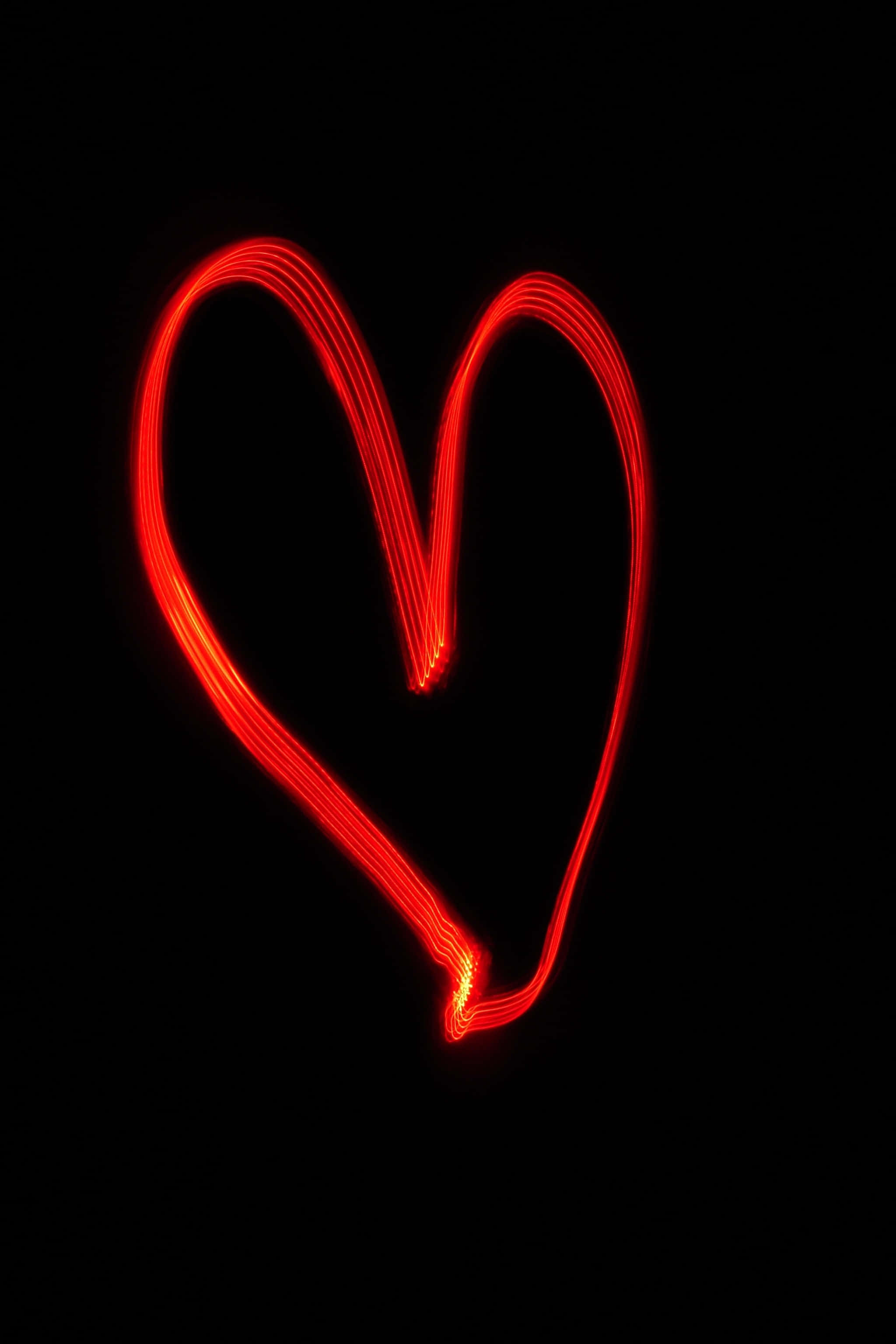 red outline heart, glowing red heart, light trails, 2K Phone Wallpaper