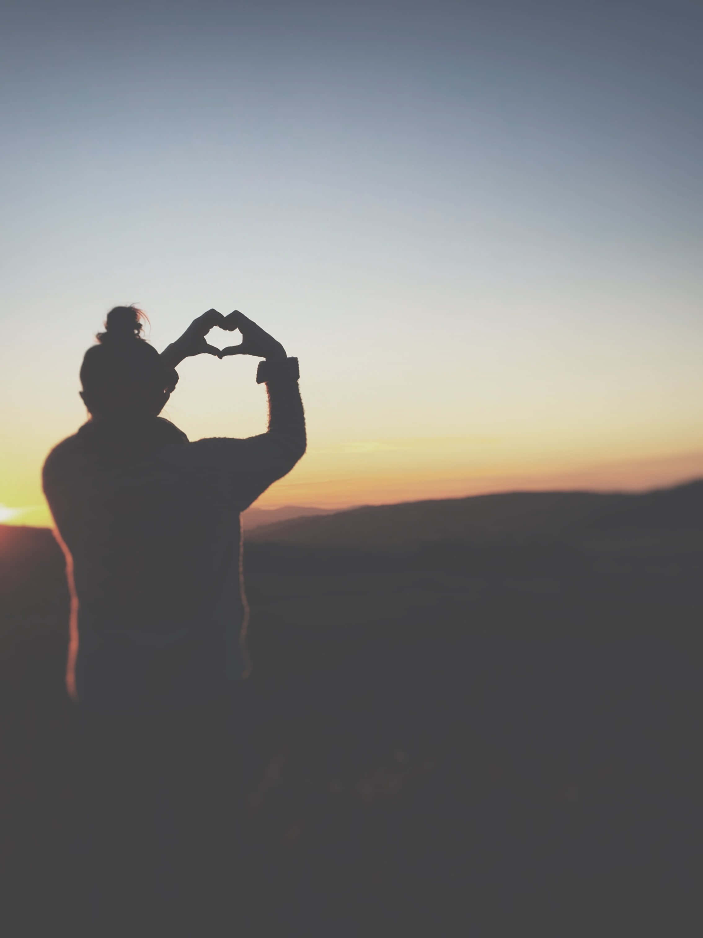 Heart Silhouette, sunset sky, rolling hills, 2K Phone Wallpaper