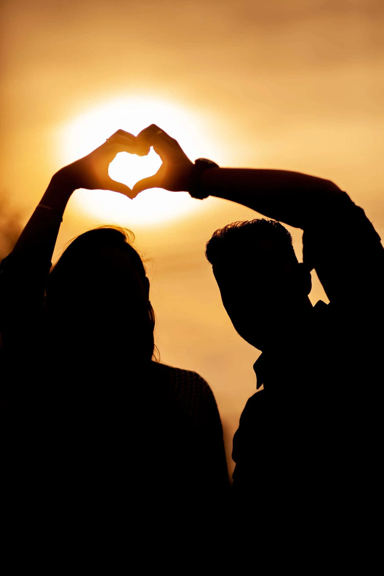 Heart Silhouette, glowing sunset sky, couple's silhouettes, Full HD Phone Wallpaper