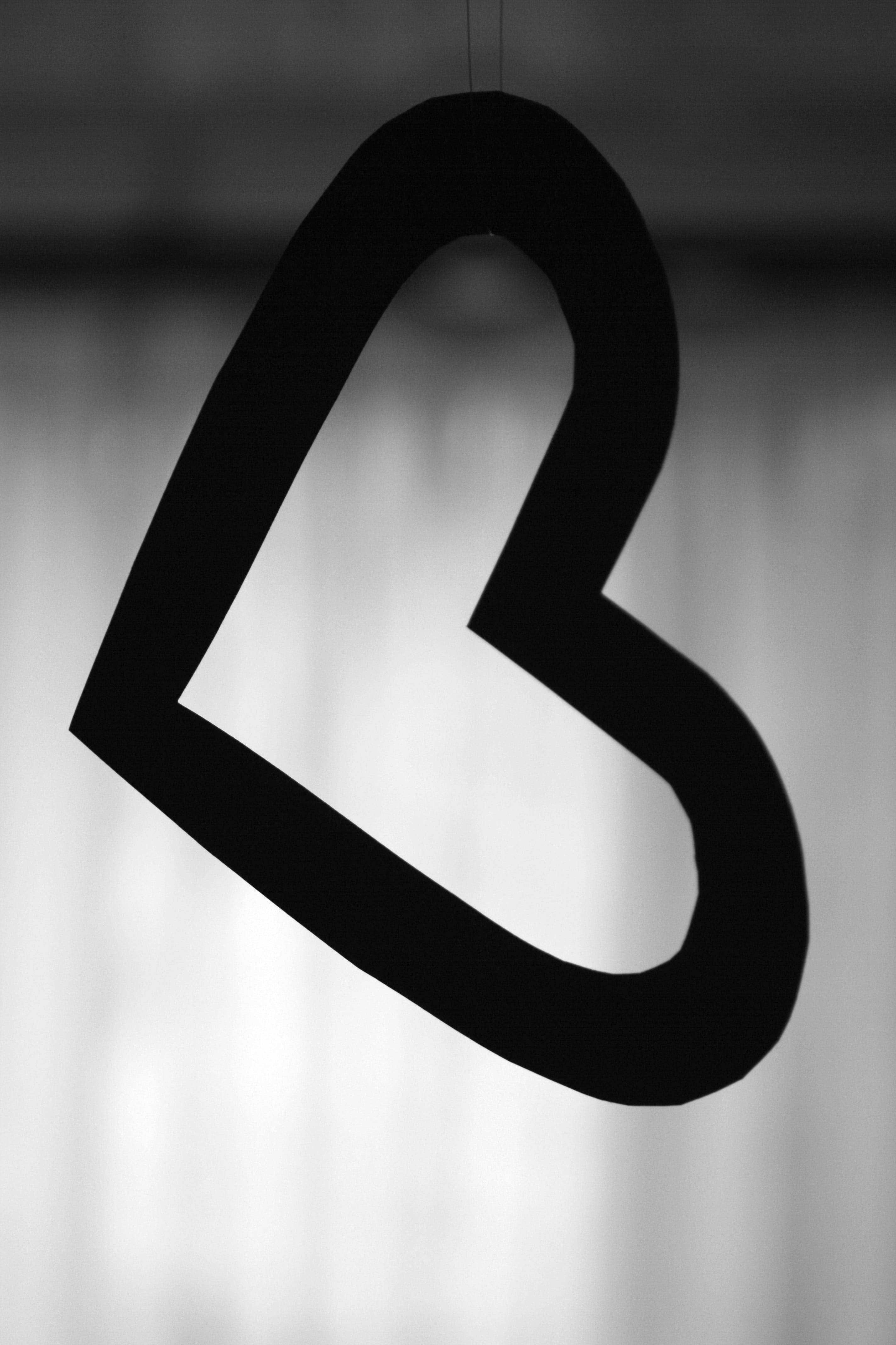 black paper heart silhouette, white curtain backdrop, stark black, 4K Phone Wallpaper