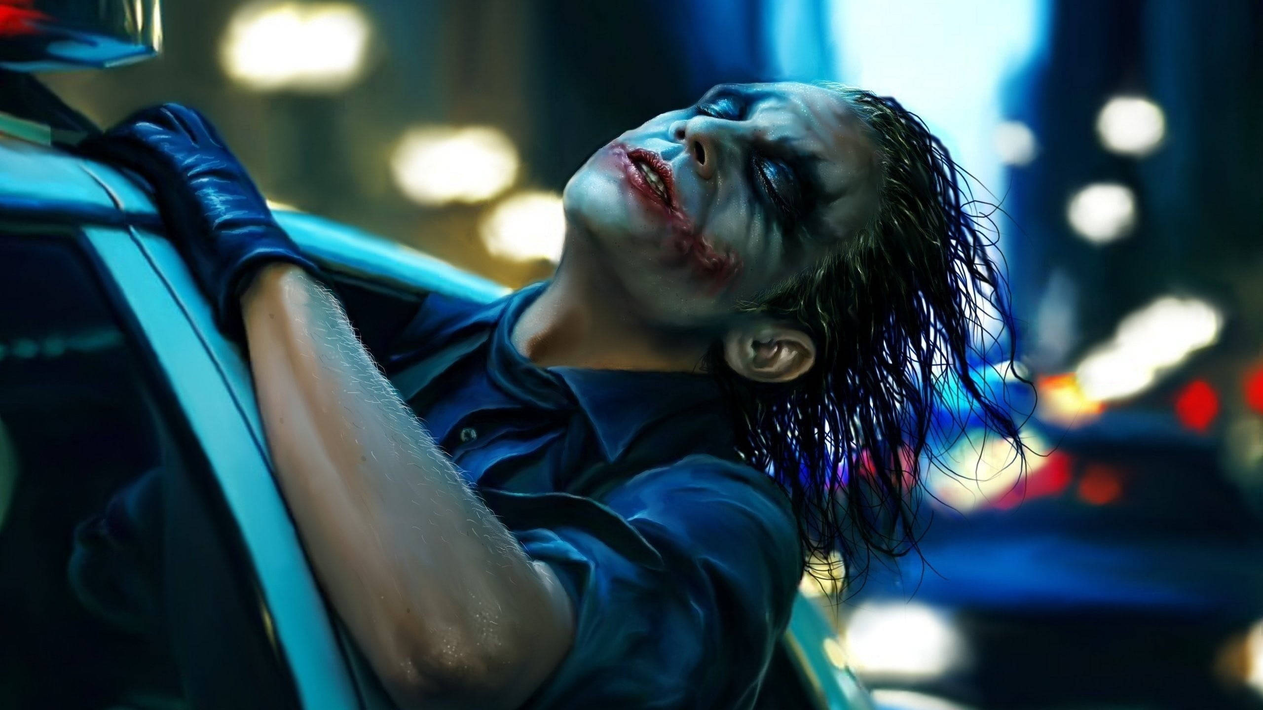 Heath Ledger Joker, police car, neon-lit city, 2K Desktop Wallpaper