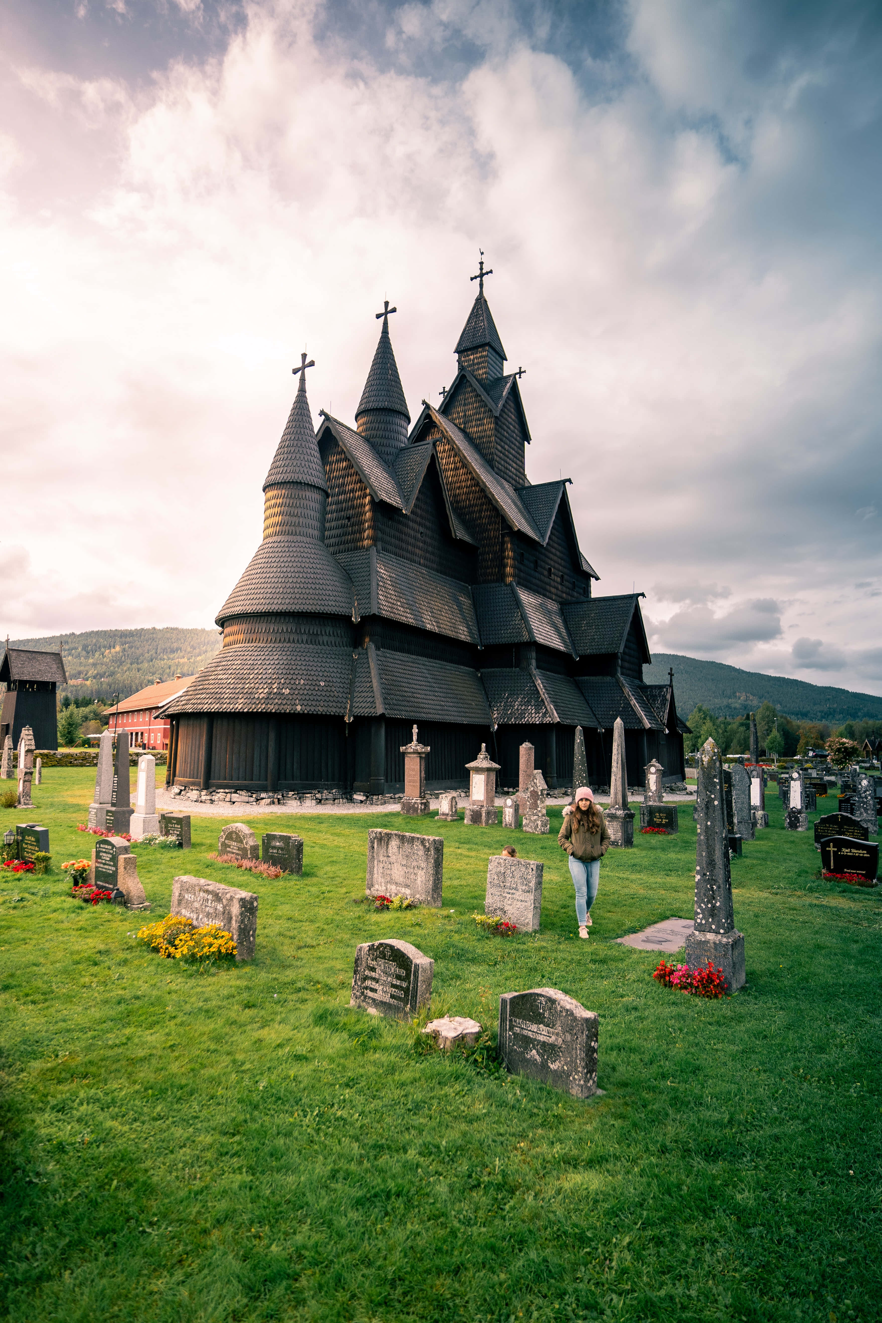 Heddal Stave Church, grassy cemetery, gravestones, 5K Phone Wallpaper