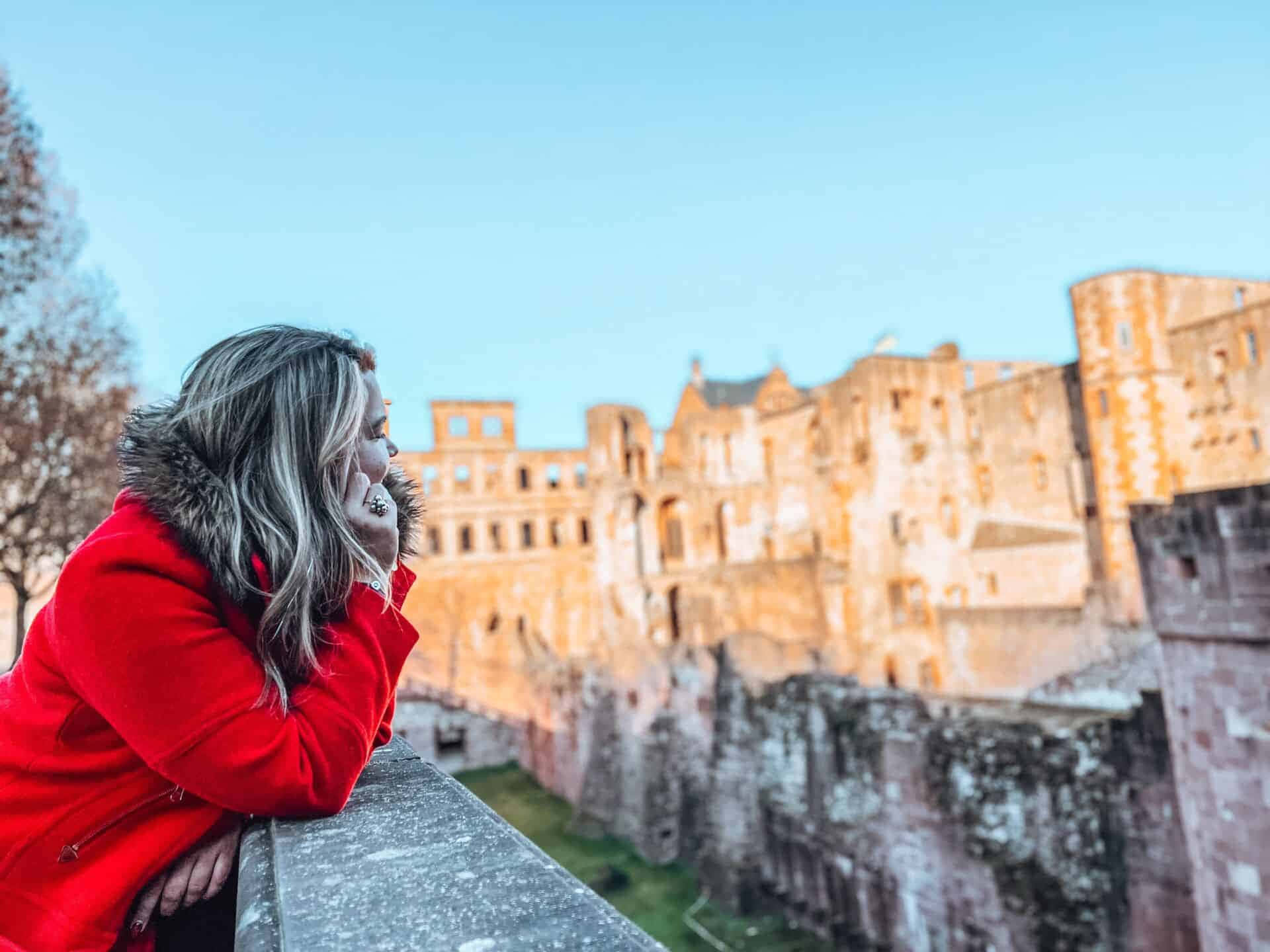 Heidelberg Castle, vibrant red coat, stone railing, Full HD Desktop Wallpaper