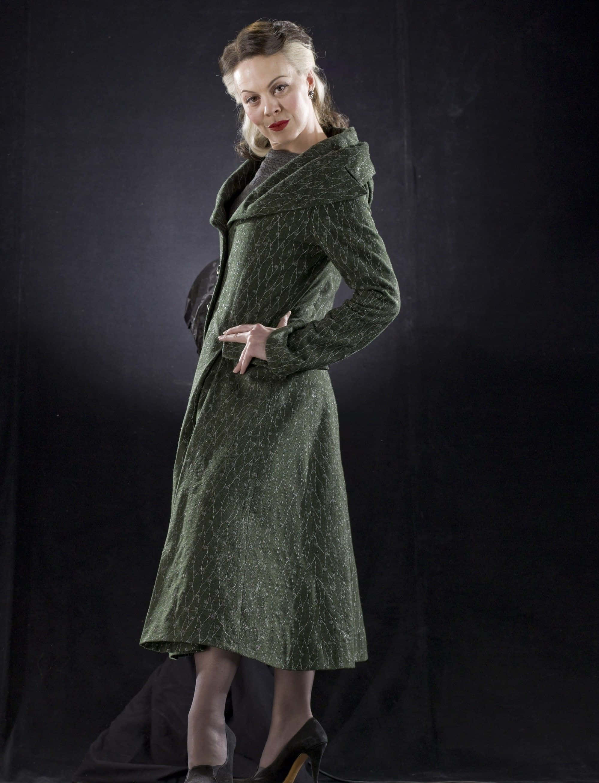 Helen McCrory, textured green coat, dark backdrop, 2K Phone Wallpaper