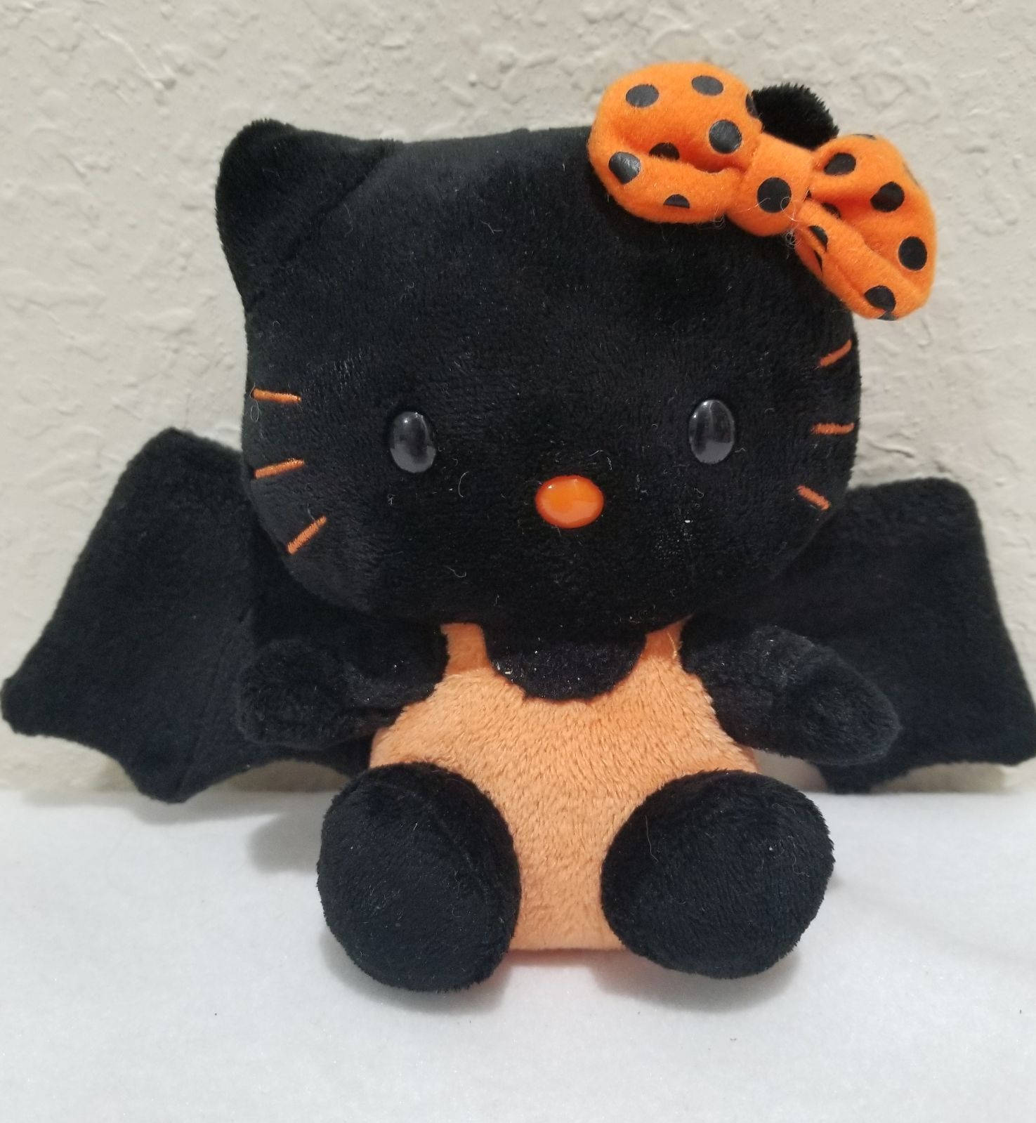 Hello Kitty, bat, orange polka dot bow, HD Phone Wallpaper