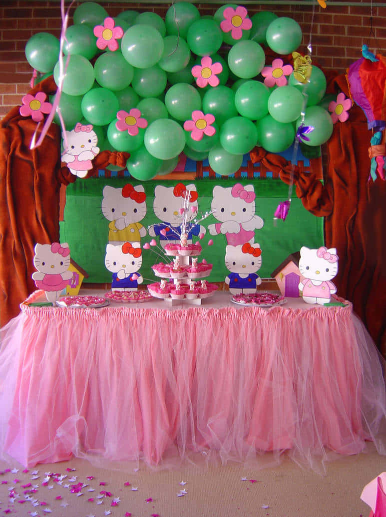 Hello Kitty, pink tulle table skirt, green balloon arch, SD Phone Wallpaper