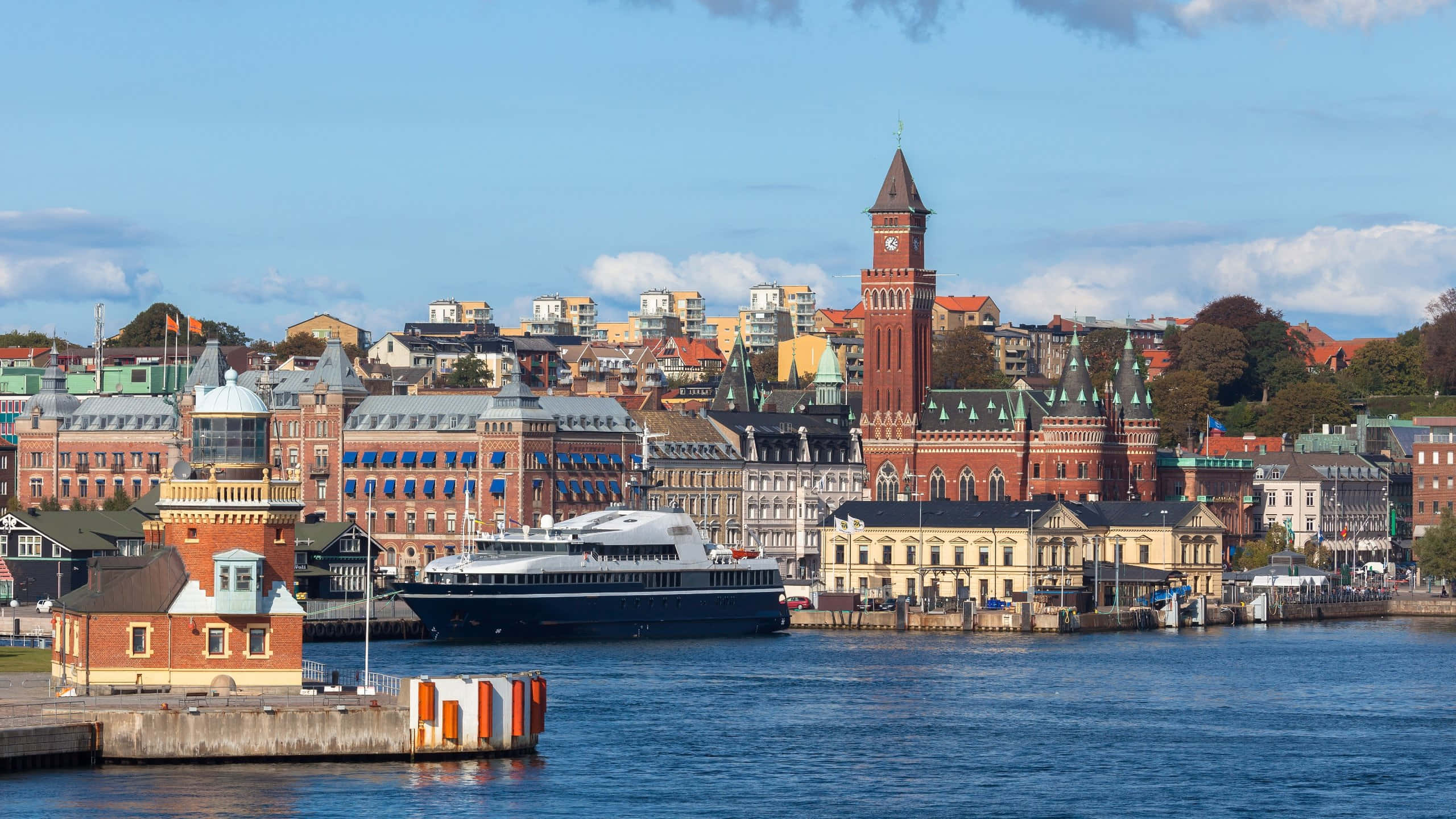 Helsingborg, red brick clock tower, historic waterfront buildings, 2K Desktop Wallpaper