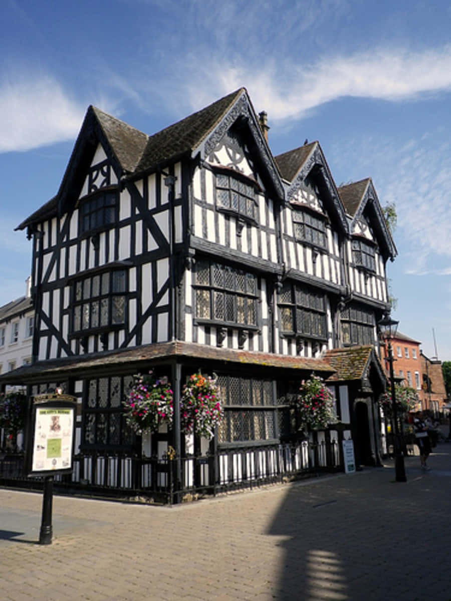 Hereford, black and white half timbered building, ornate gables, SD Phone Wallpaper
