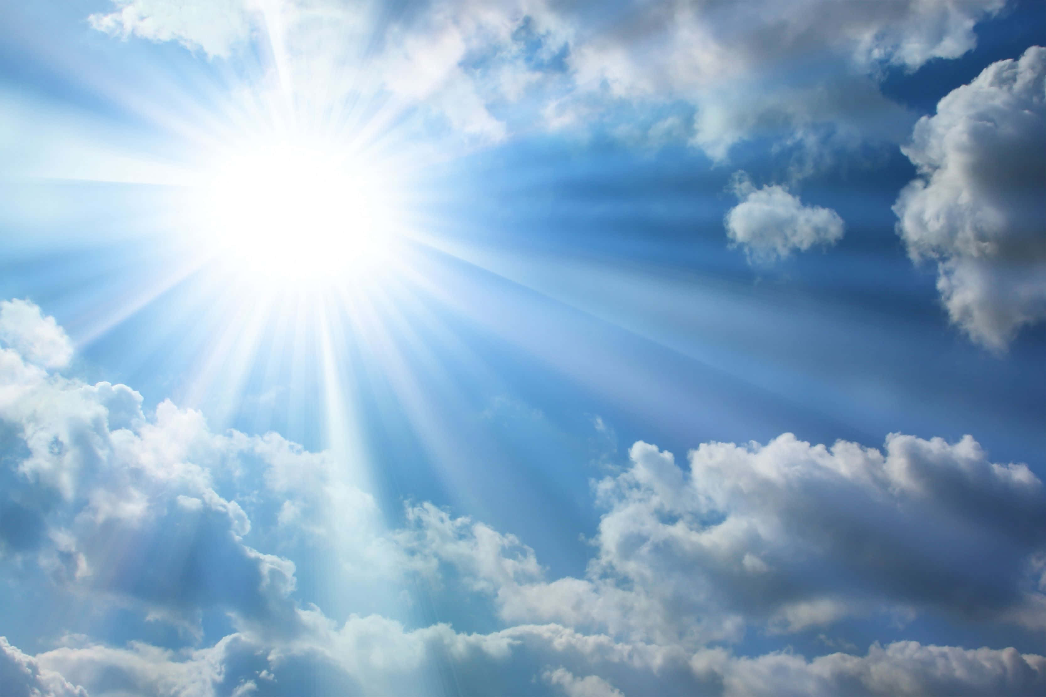 Hi Res Sky, sunburst, fluffy white clouds, 2K Desktop Wallpaper