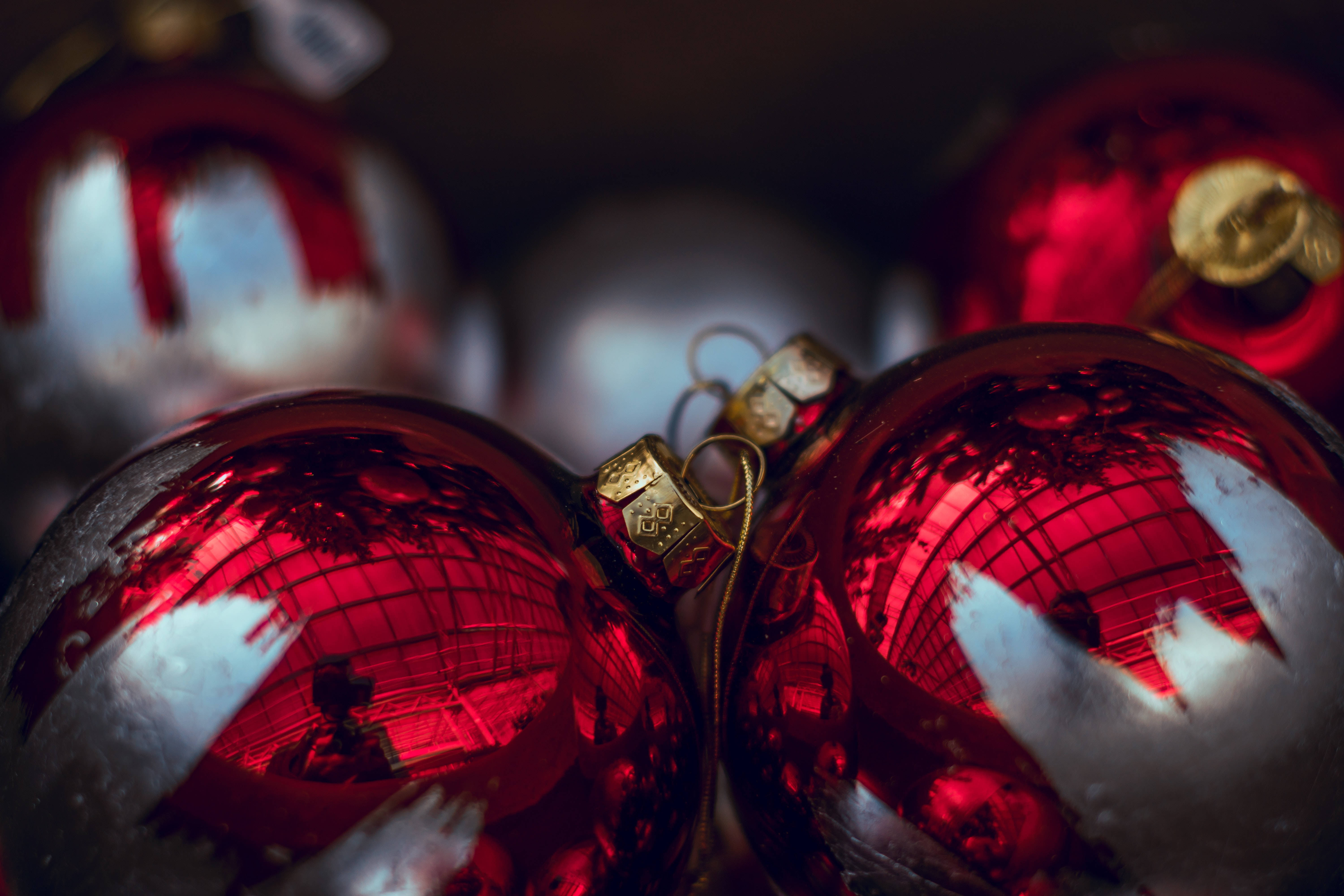 glossy red Christmas ornaments, grid ceiling, soft light, 5K Desktop Wallpaper