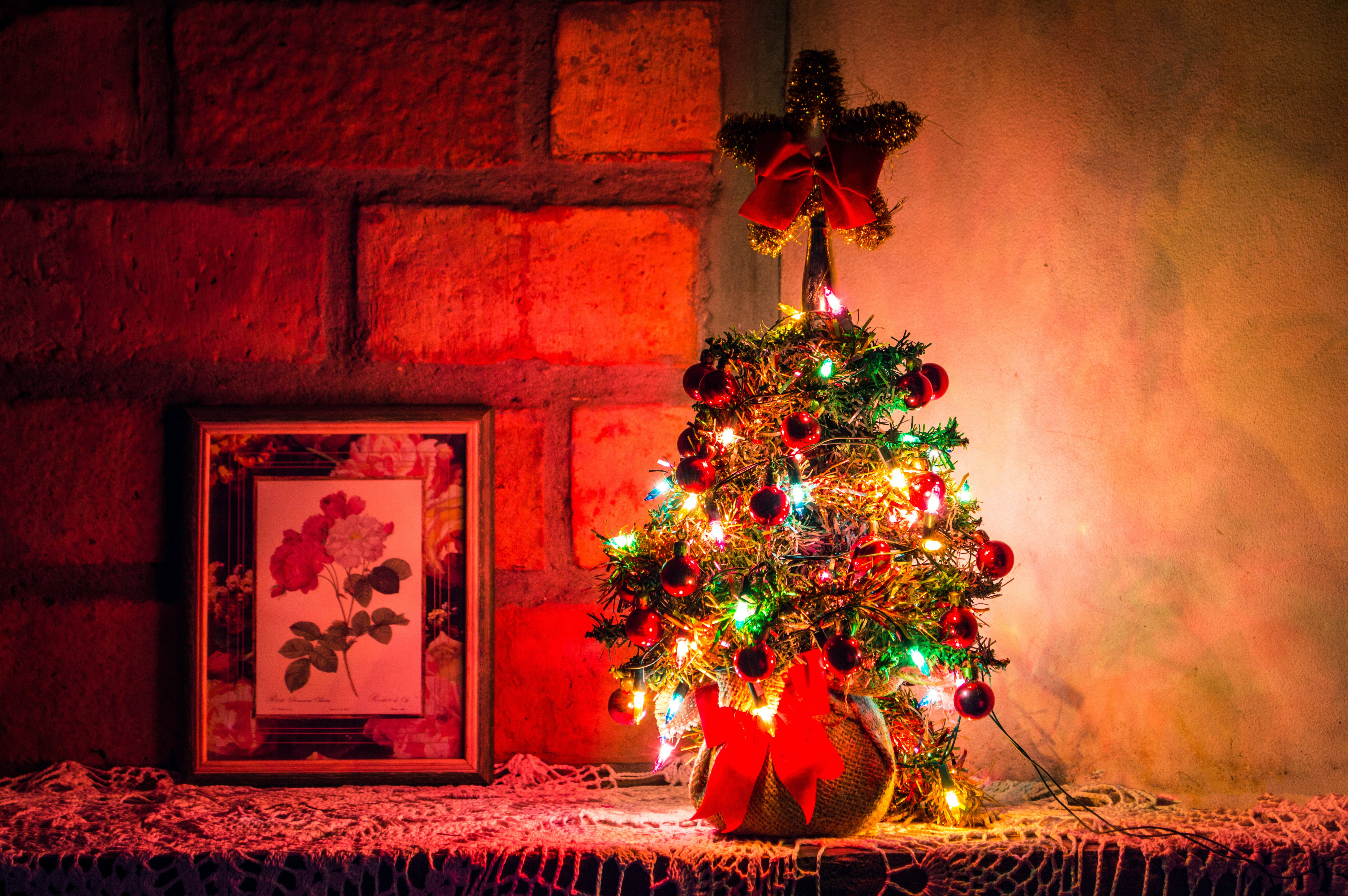 High Resolution Christmas Mini Tree, colorful lights, red ornaments, 5K Desktop Wallpaper