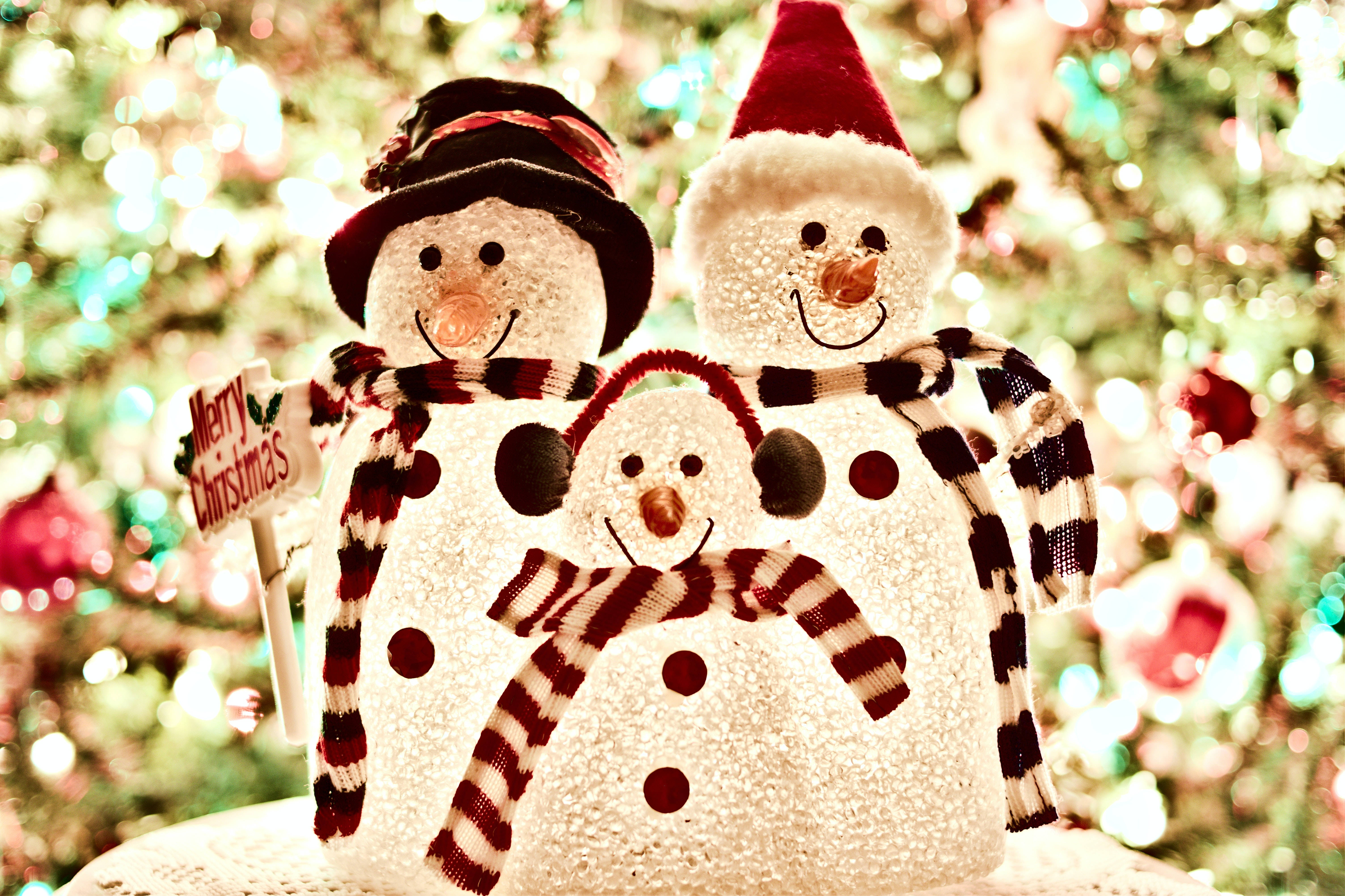 snowman family, glowing Christmas tree, colorful ornaments, 5K Desktop Wallpaper