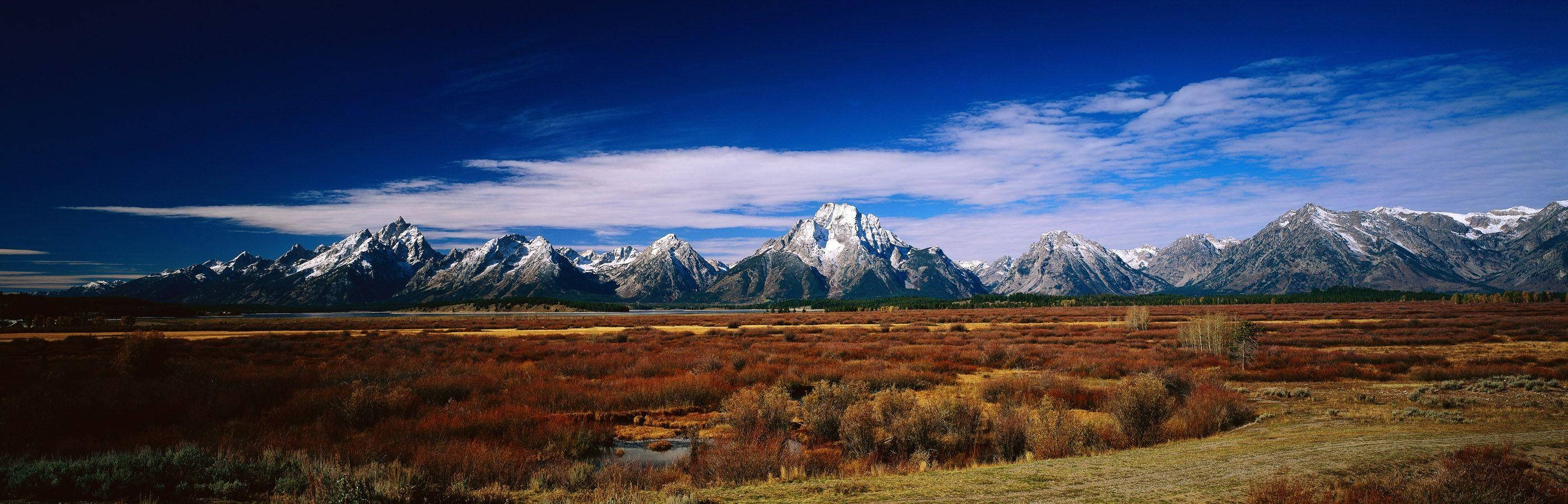 mountain range, golden autumn meadow, deep blue sky, 2K Desktop Wallpaper