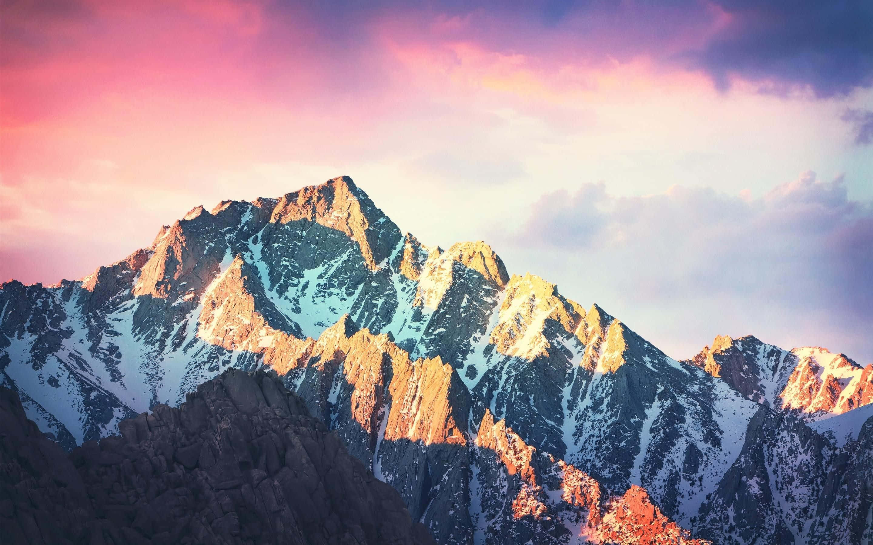 High Sierra, snowcapped mountain peaks, golden light, 2K Desktop Wallpaper