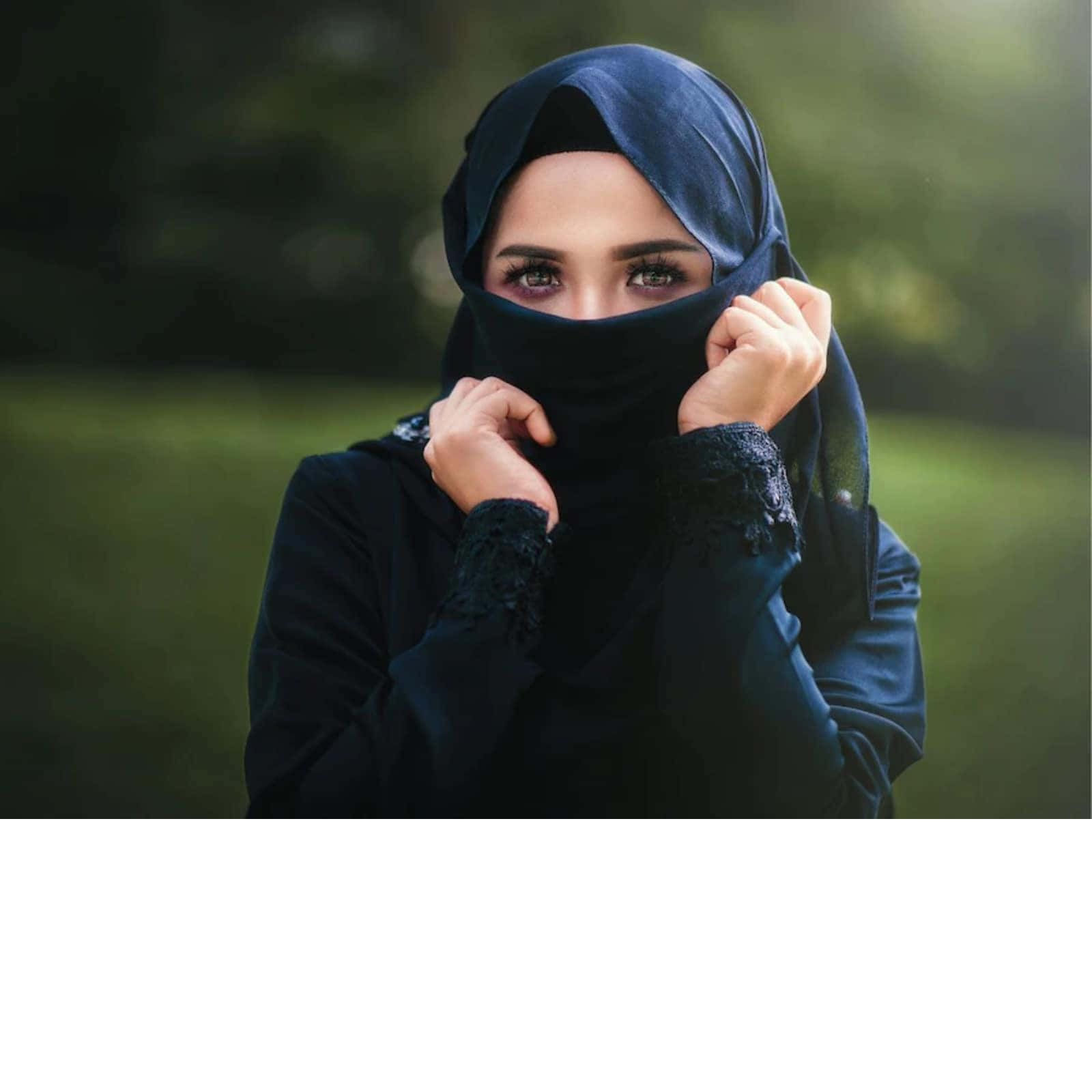 dark blue hijab, expressive eyes, soft green blurred background, HD Desktop Wallpaper