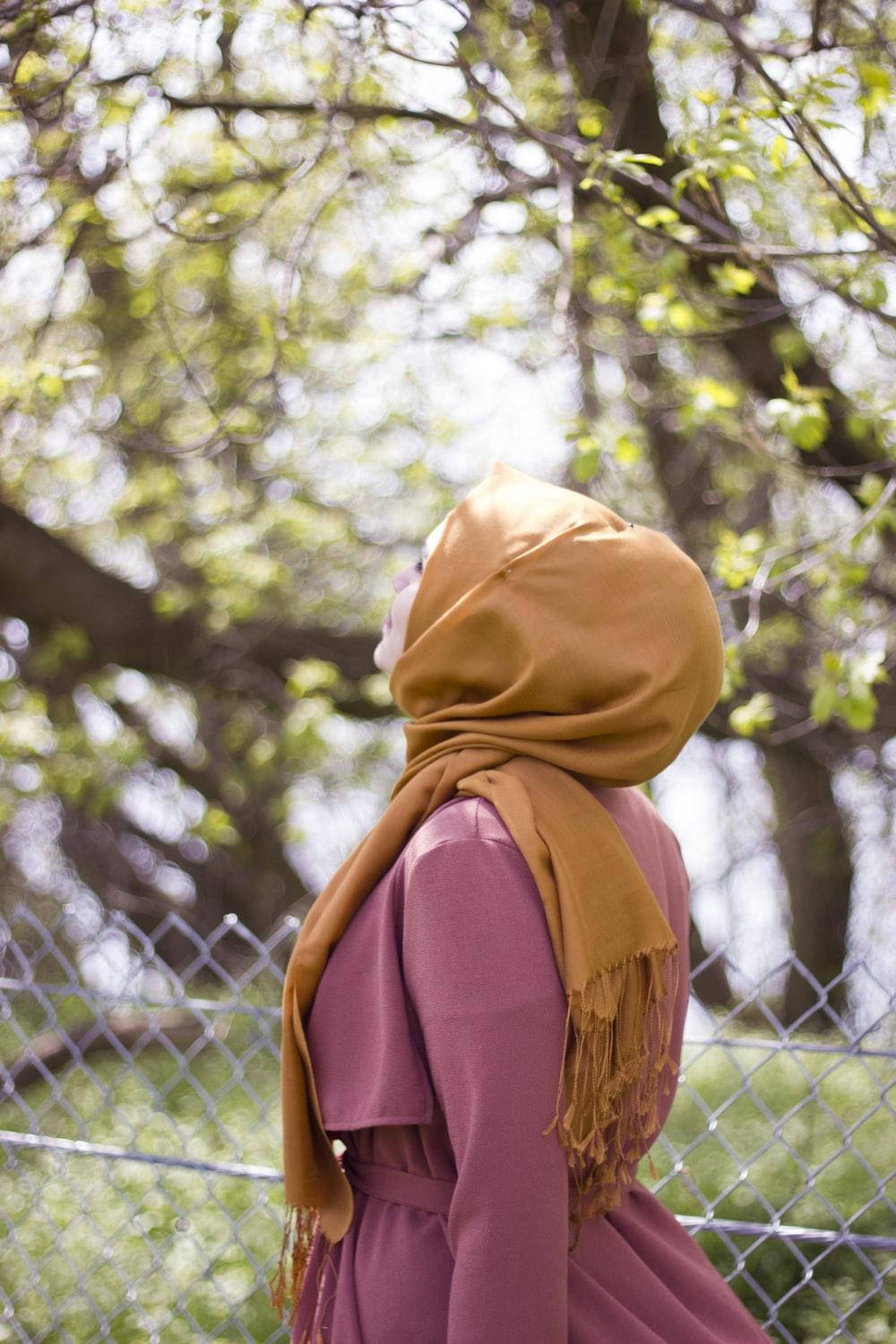 mustard hijab, mauve coat, sunlit canopy of budding trees, HD Phone Wallpaper