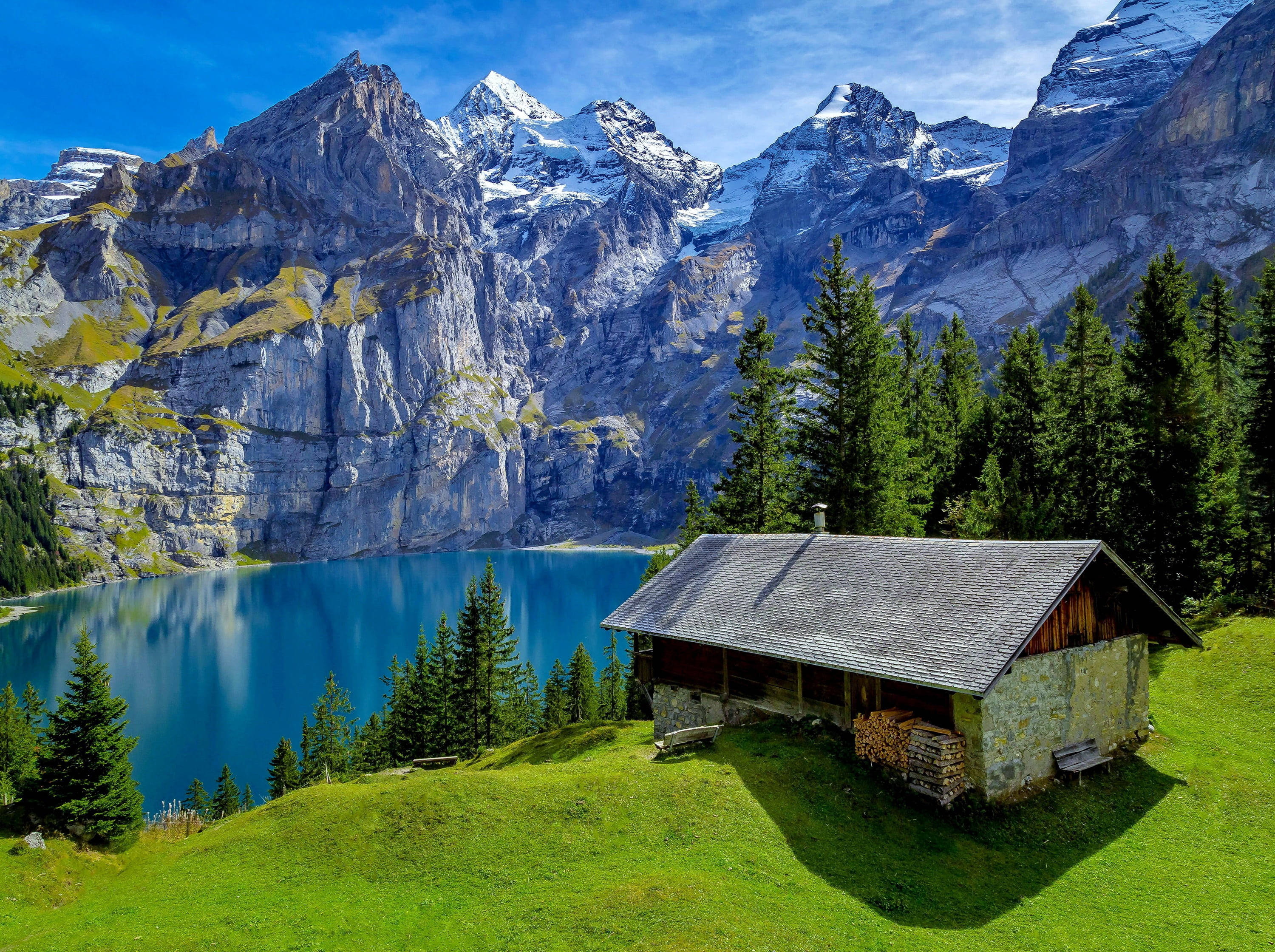 lake cabin, sunlit green hill, deep blue alpine lake, 2K Desktop Wallpaper