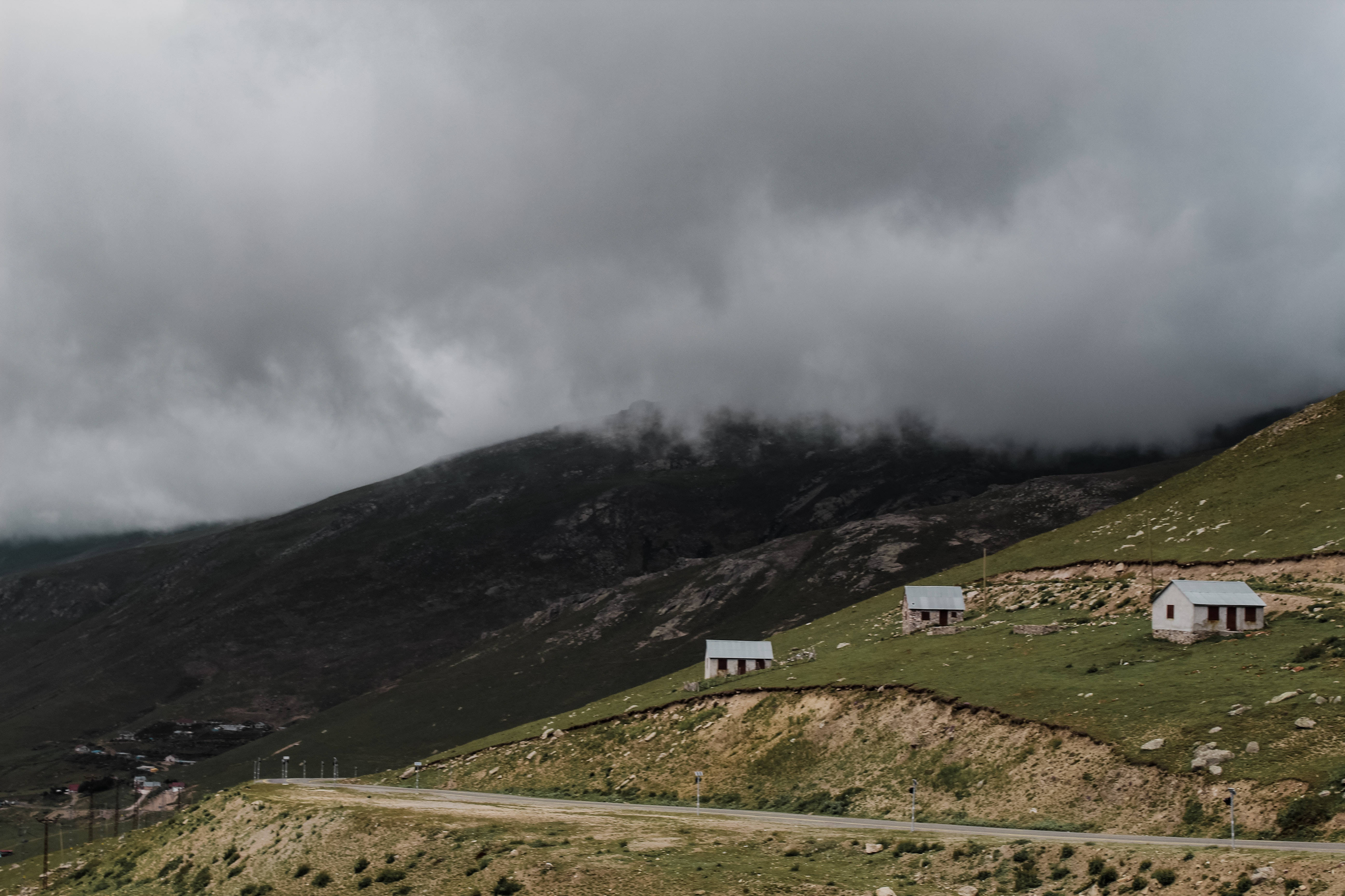 Hill View, gray sky, three small houses, 5K Desktop Wallpaper