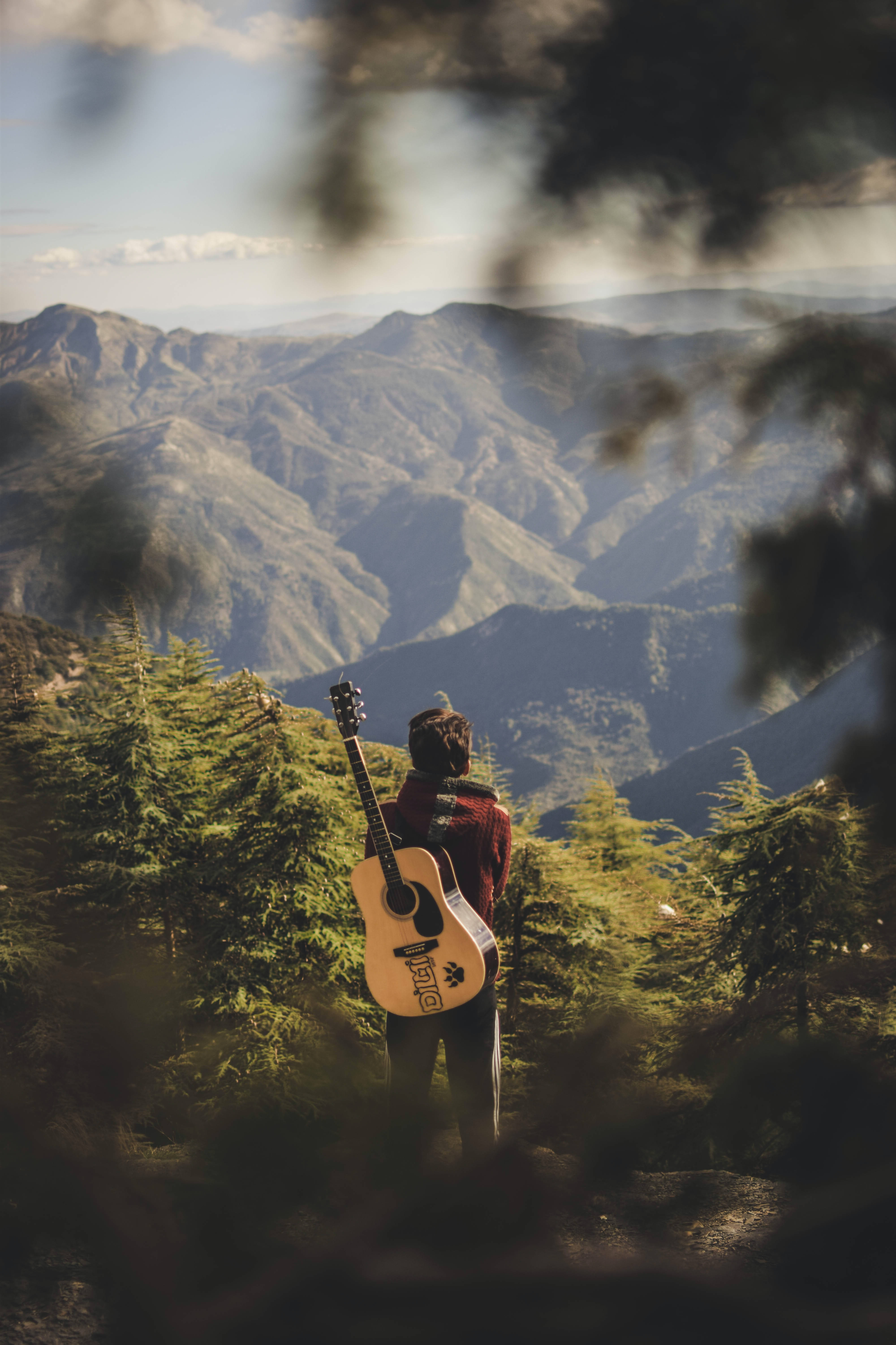 acoustic guitar, forested mountain ridge, layered peaks, 5K Phone Wallpaper