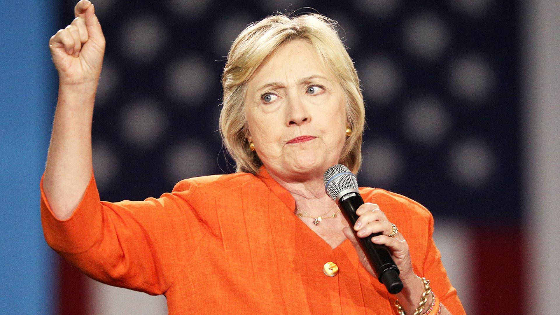 Hillary Clinton, orange jacket, microphone, Full HD Desktop Wallpaper