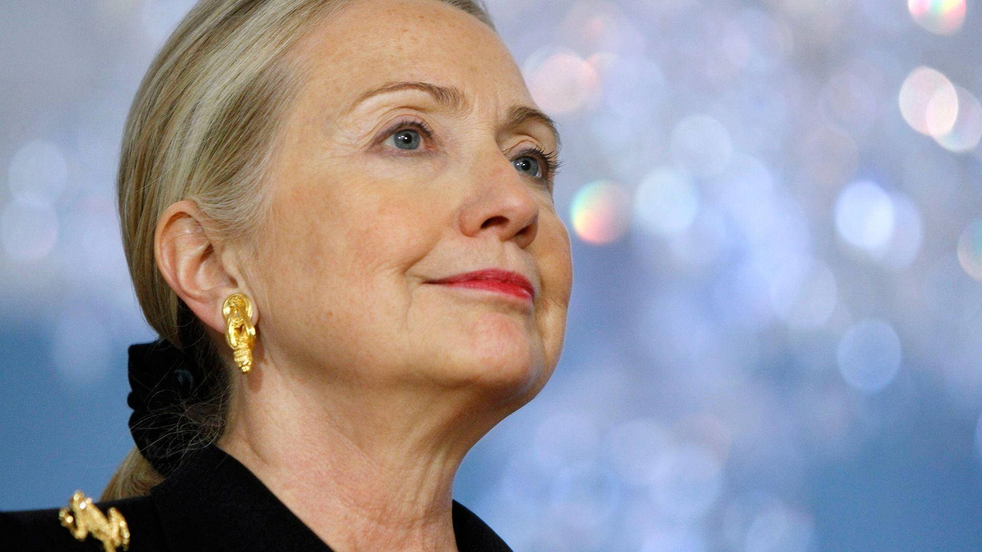 Hillary Clinton, gazes upward, gentle smile, Full HD Desktop Wallpaper