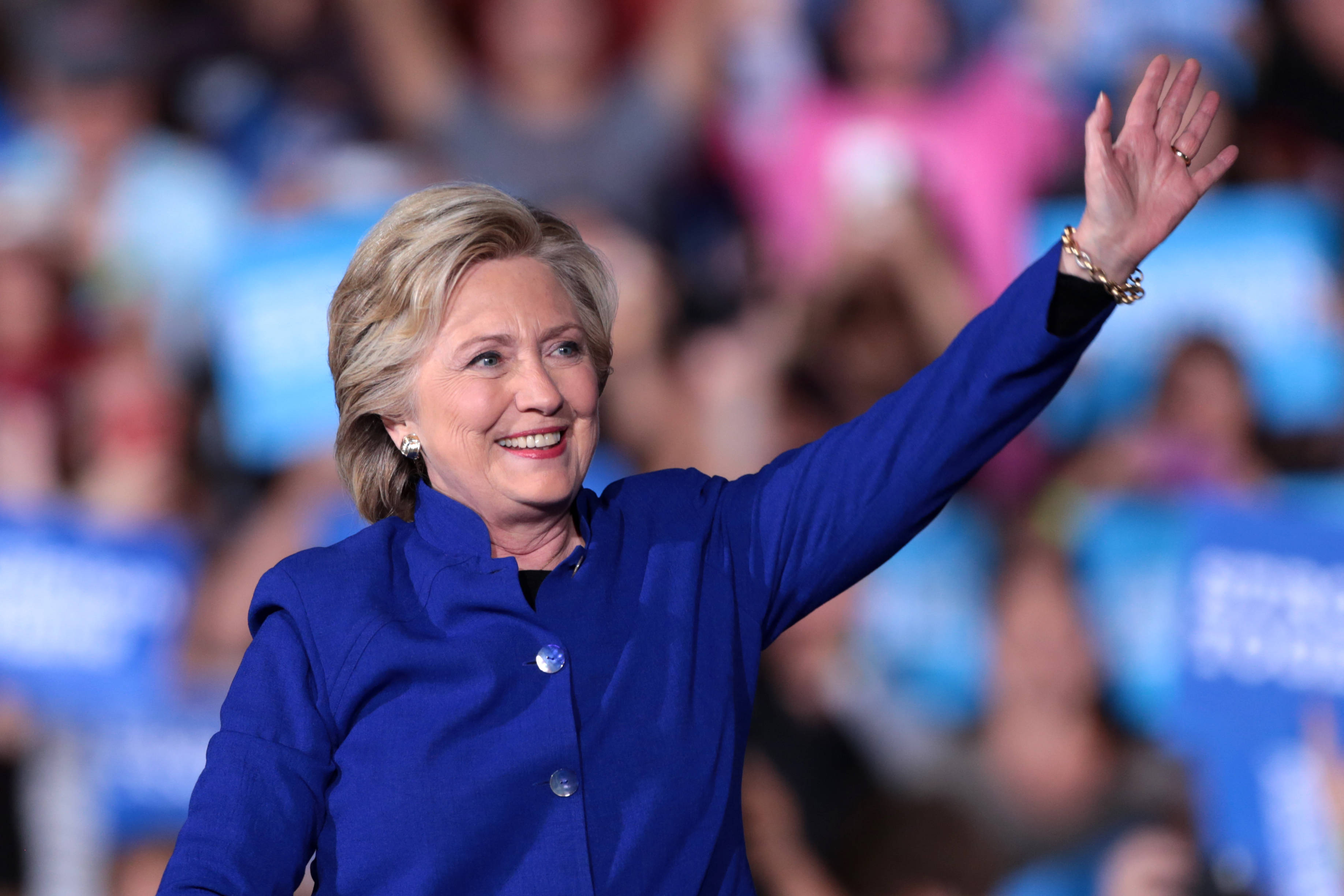 Hillary Clinton, vibrant blue suit, political rally, 2K Desktop Wallpaper
