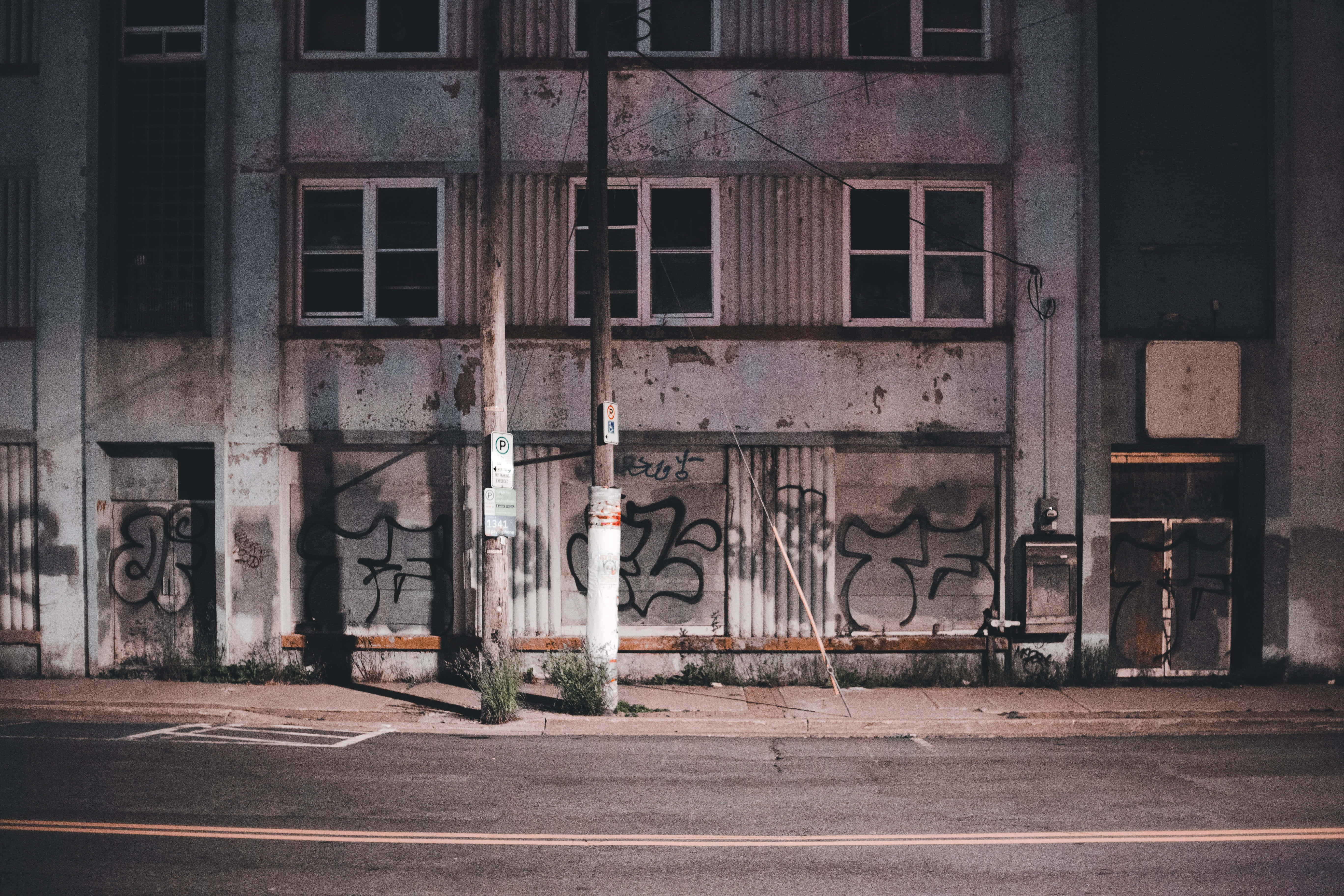 Ghetto Hood, graffiti-covered walls, dim twilight lighting, 5K Desktop Wallpaper