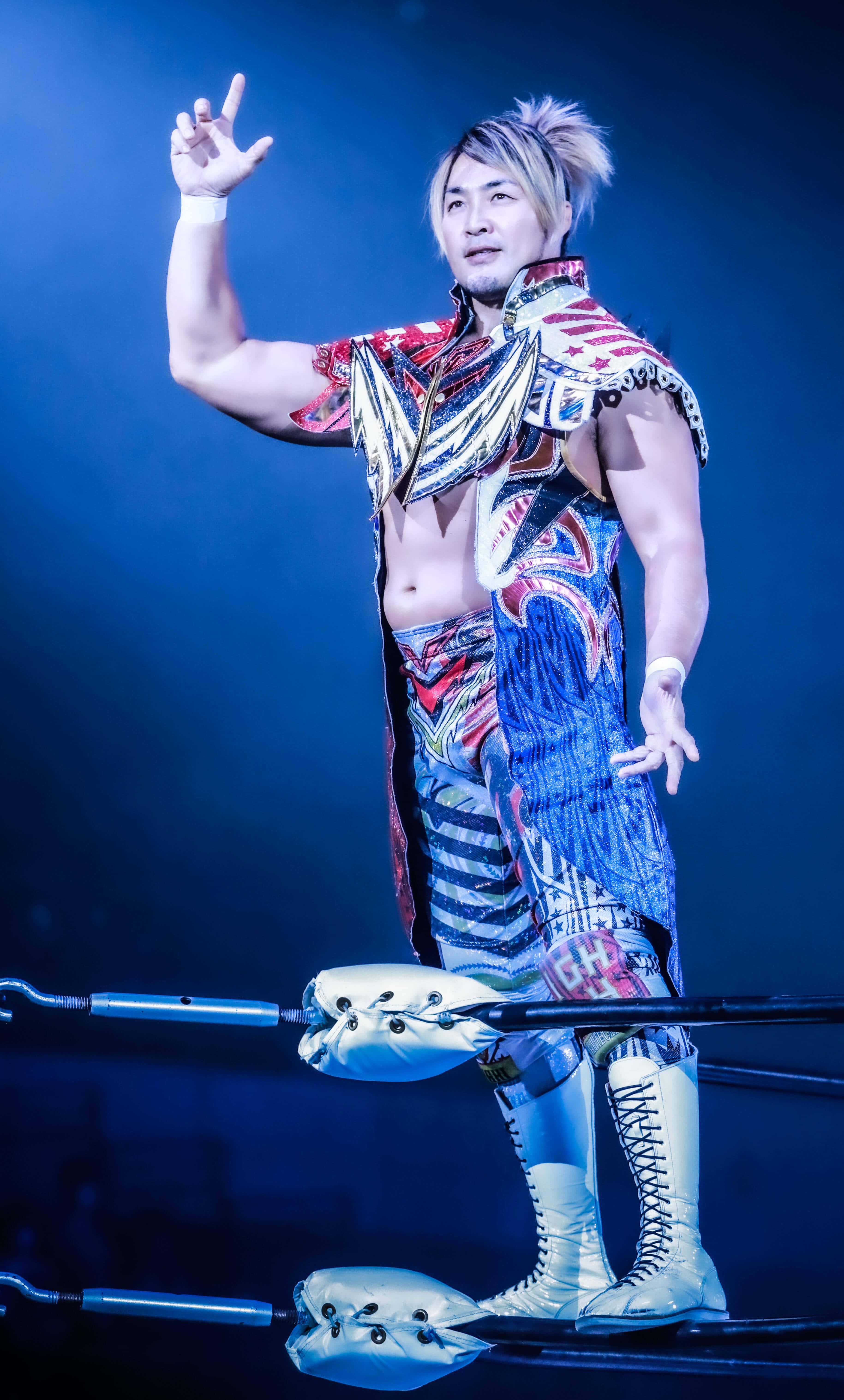 Hiroshi Tanahashi, wrestling pose, colorful patterned outfit, 5K Phone Wallpaper