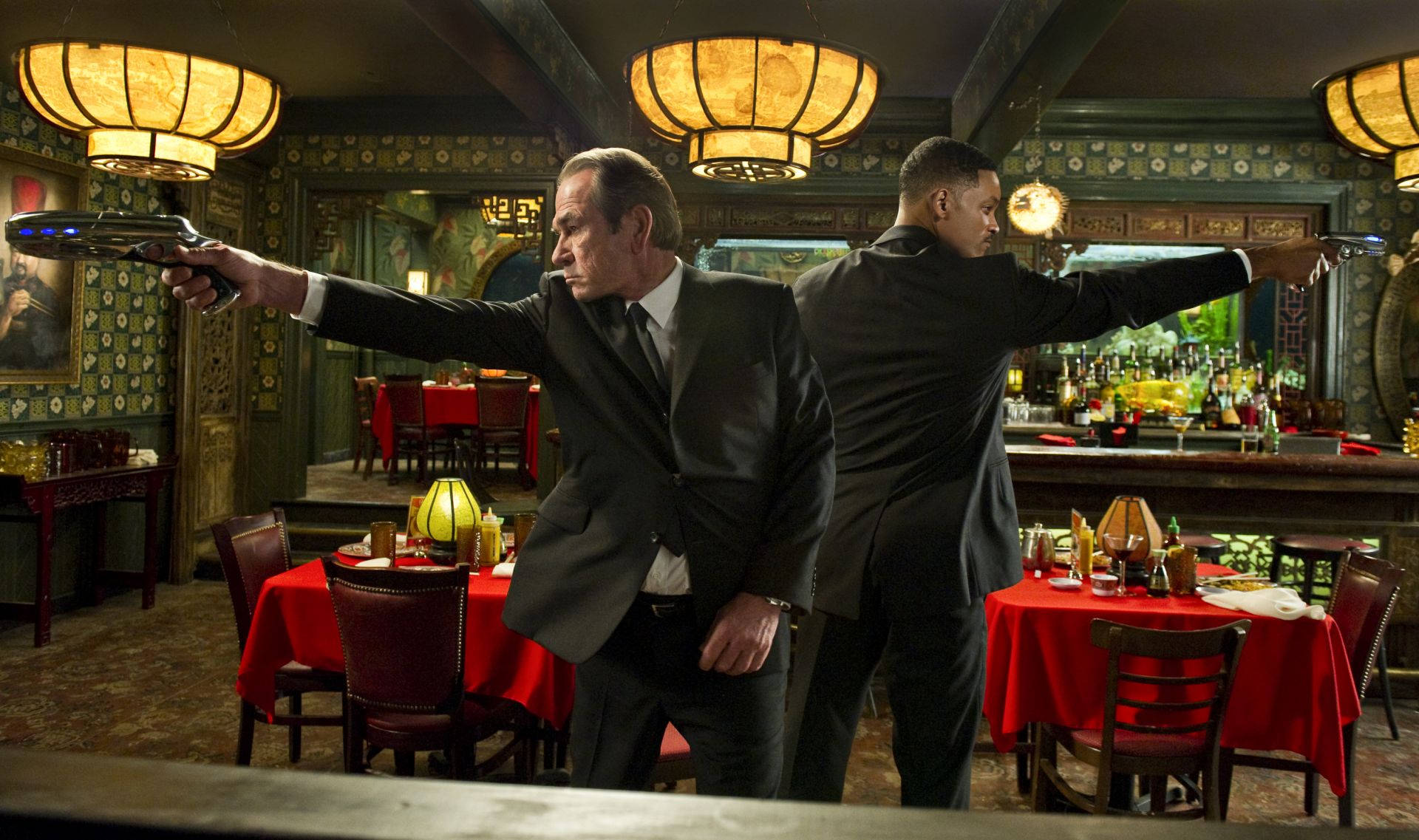 Men In Black, futuristic guns, dimly lit ornate restaurant, Full HD Desktop Wallpaper
