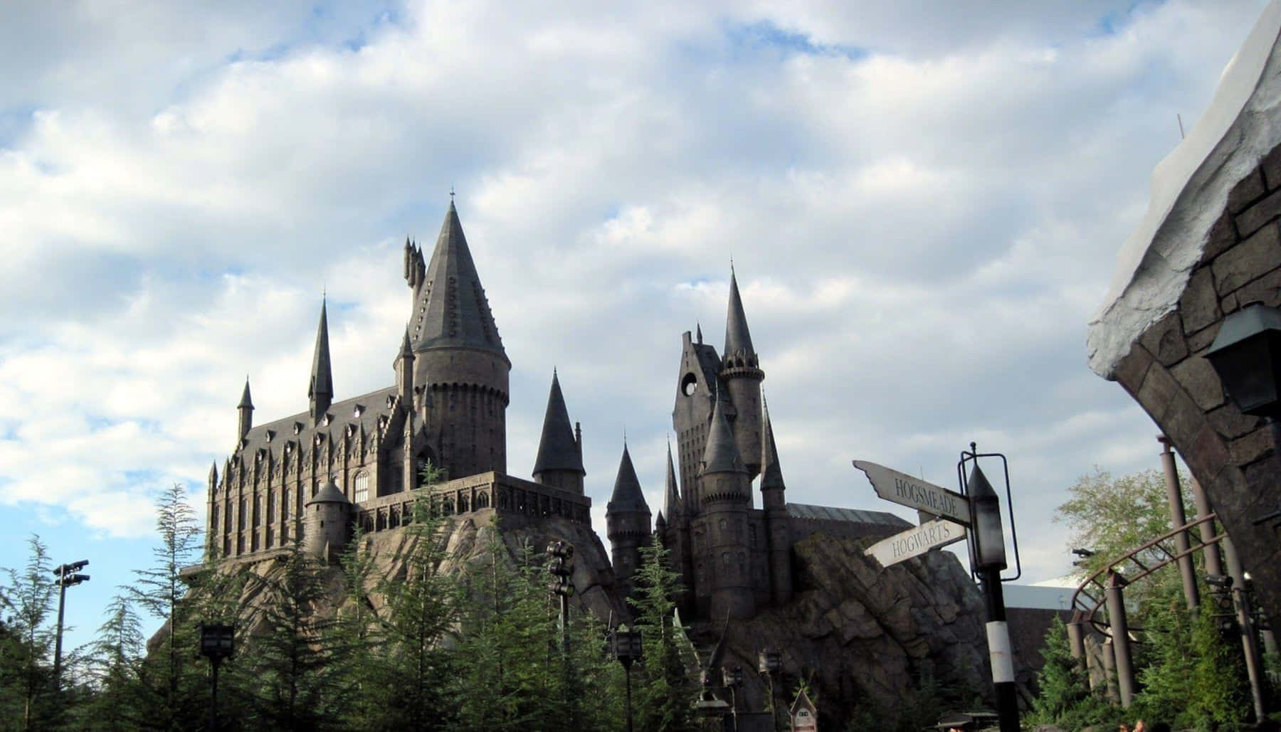 Hogwarts Castle, rocky hill, partly cloudy sky, HD Desktop Wallpaper