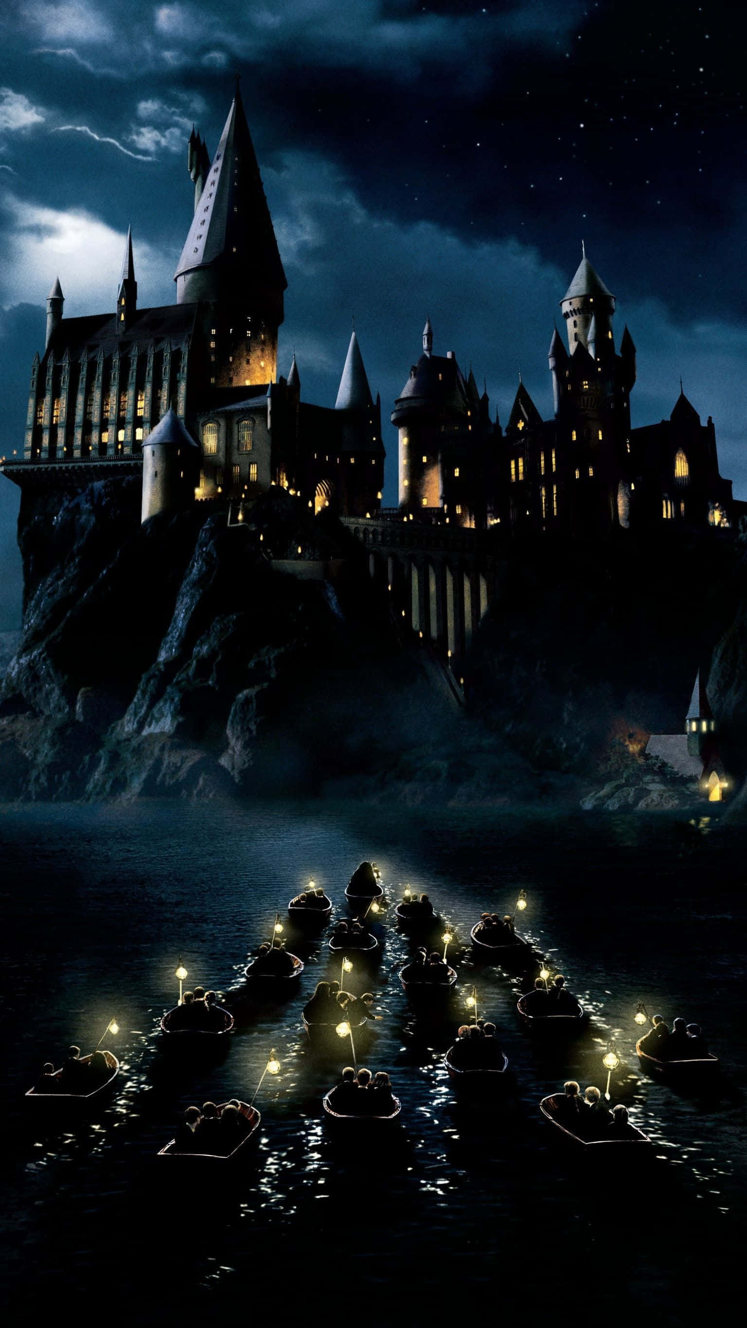 Hogwarts Castle, Night, glowing windows, 2K Phone Wallpaper