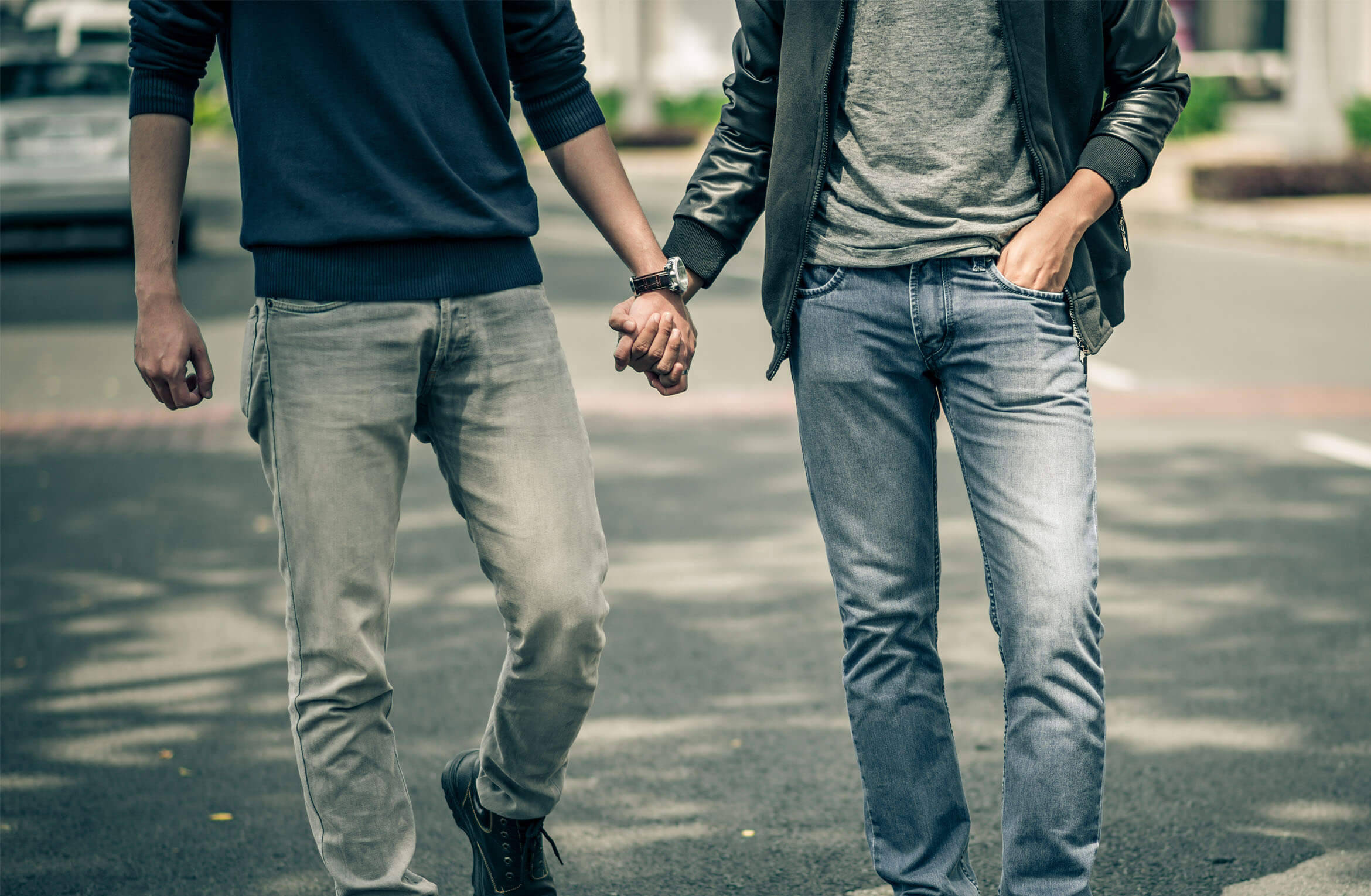 Gay Men Holding Hands, sunlit city street, casual jeans, Full HD Desktop Wallpaper