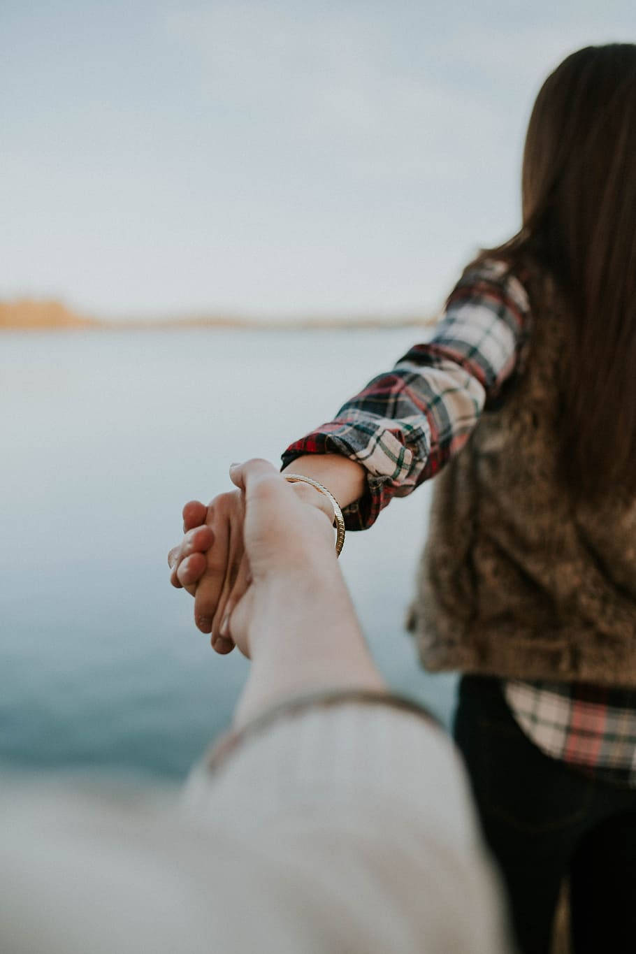 Holding Hands Into The Sea, calm lake, soft daylight, HD Phone Wallpaper