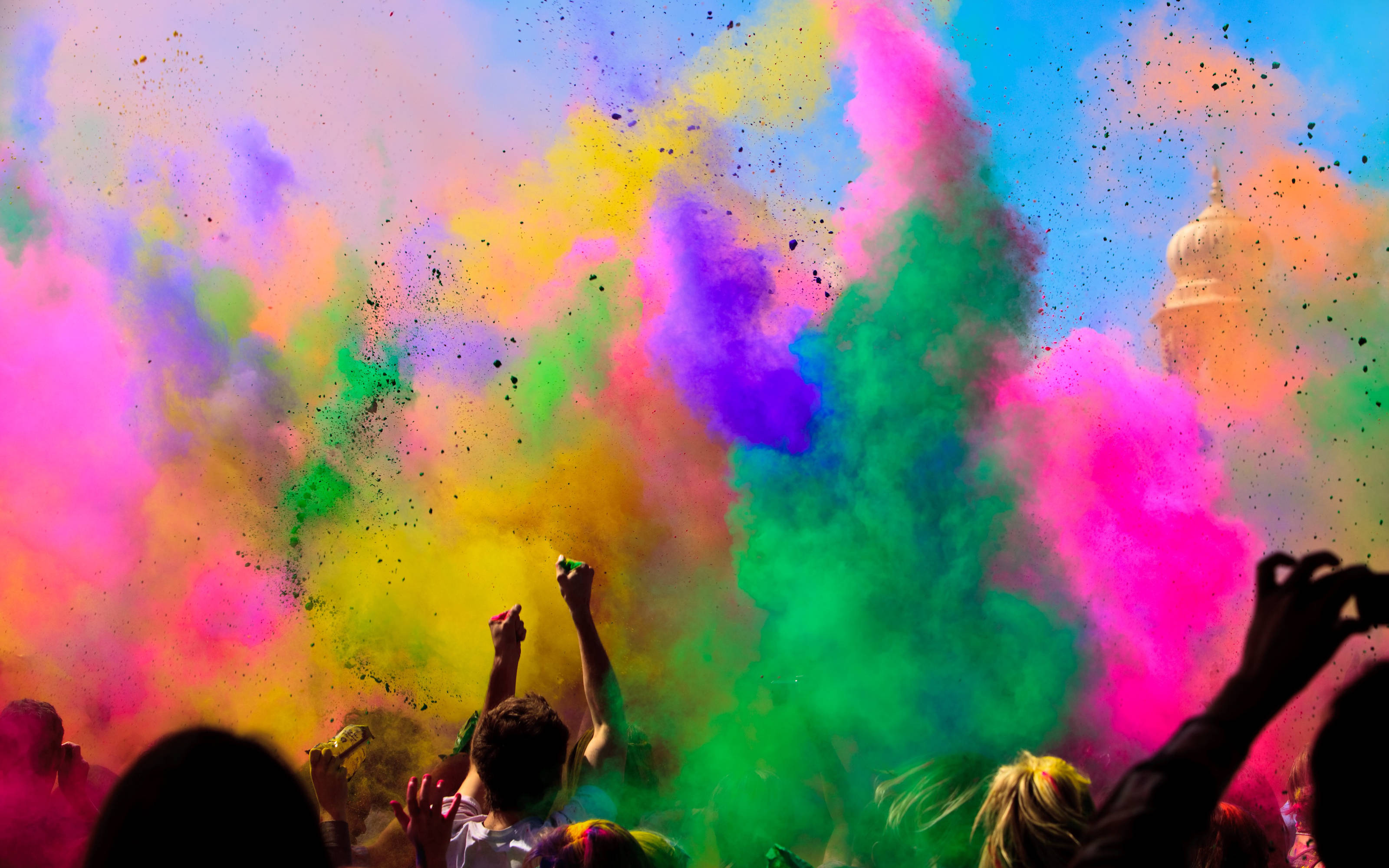 rainbow-colored powders, bright sky, people celebrate, 2K Desktop Wallpaper