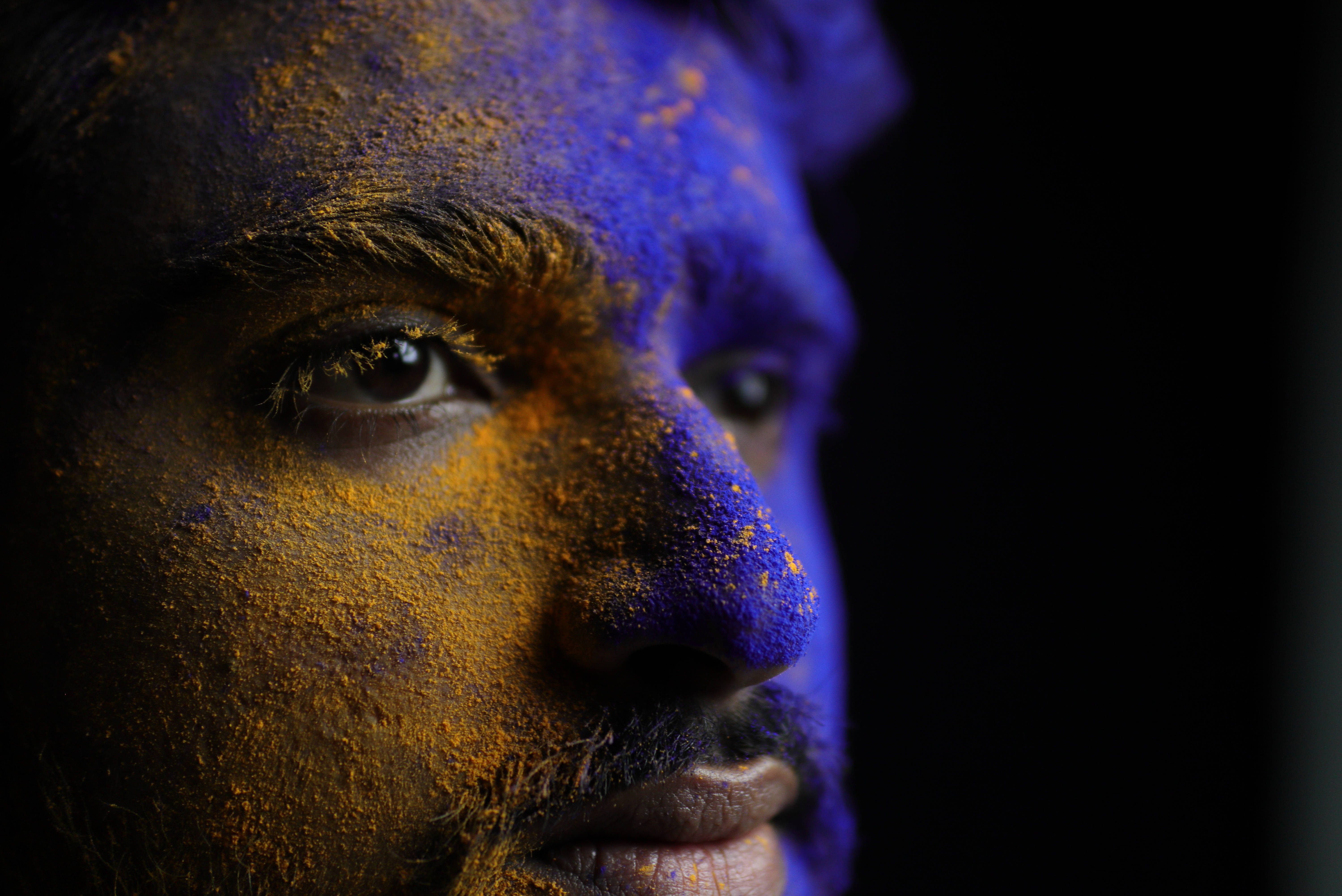 Holi, vibrant blue, golden-yellow powder, 5K Desktop Wallpaper