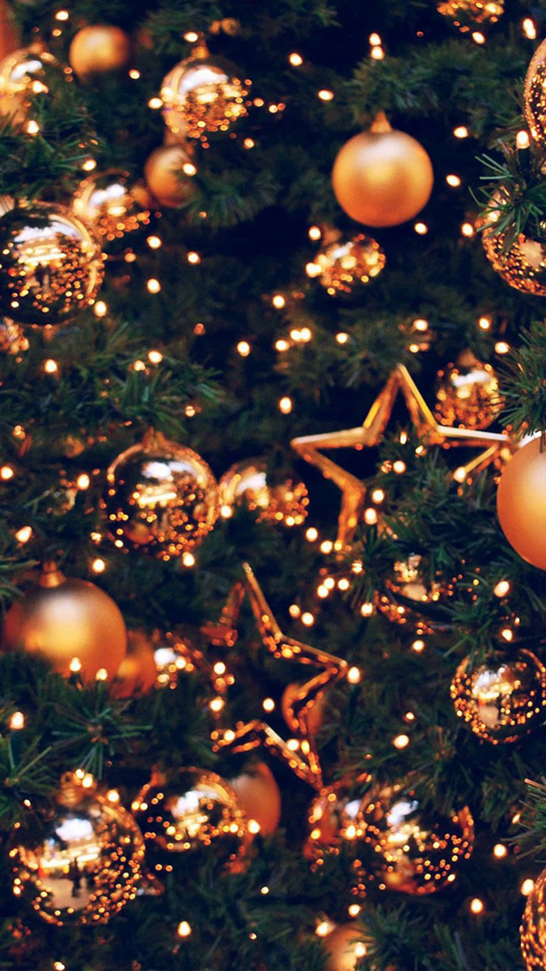 Christmas tree, shimmering gold ornaments, twinkling fairy lights, Full HD Phone Wallpaper