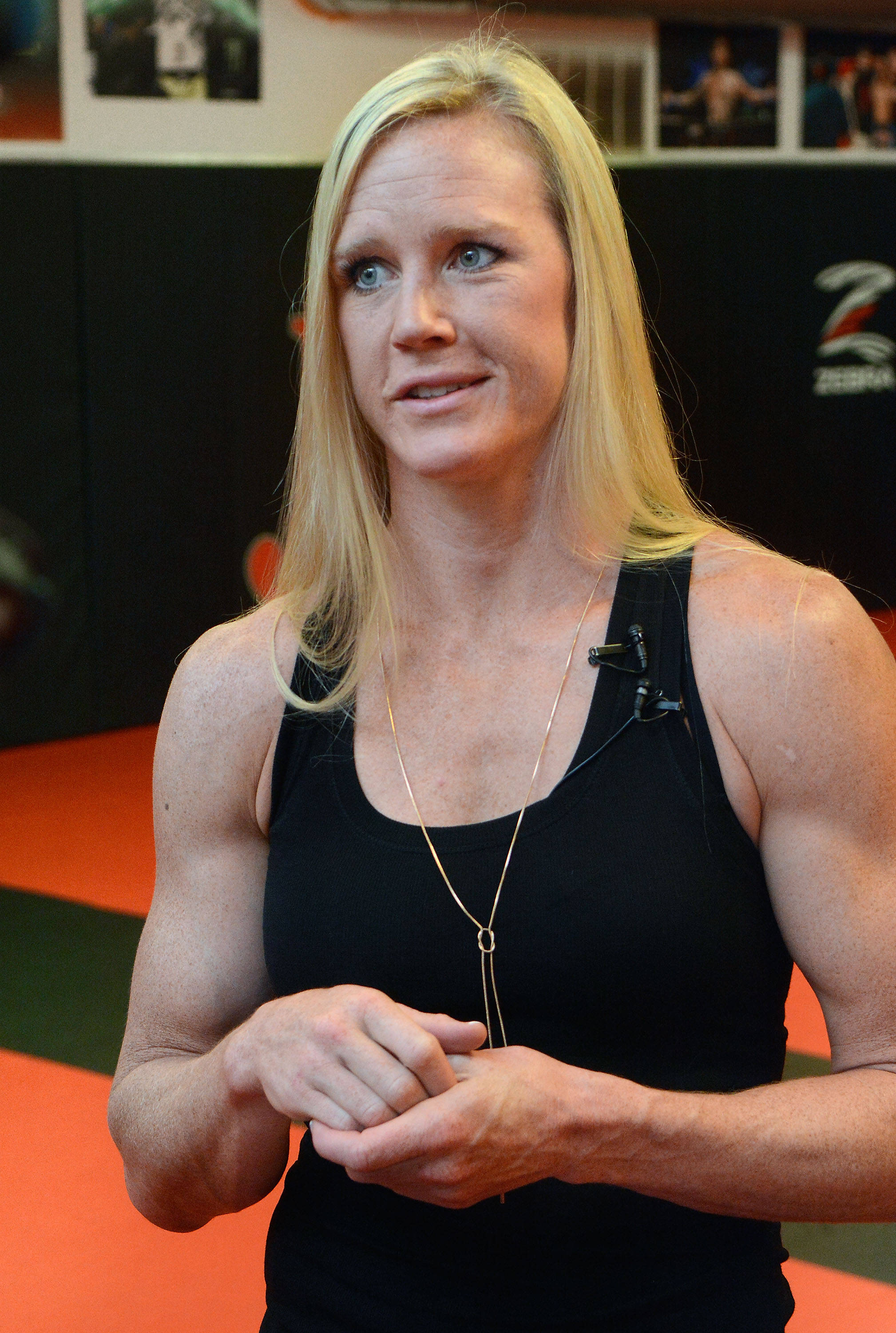 Holly Holm, blonde hair, black tank top, 2K Phone Wallpaper