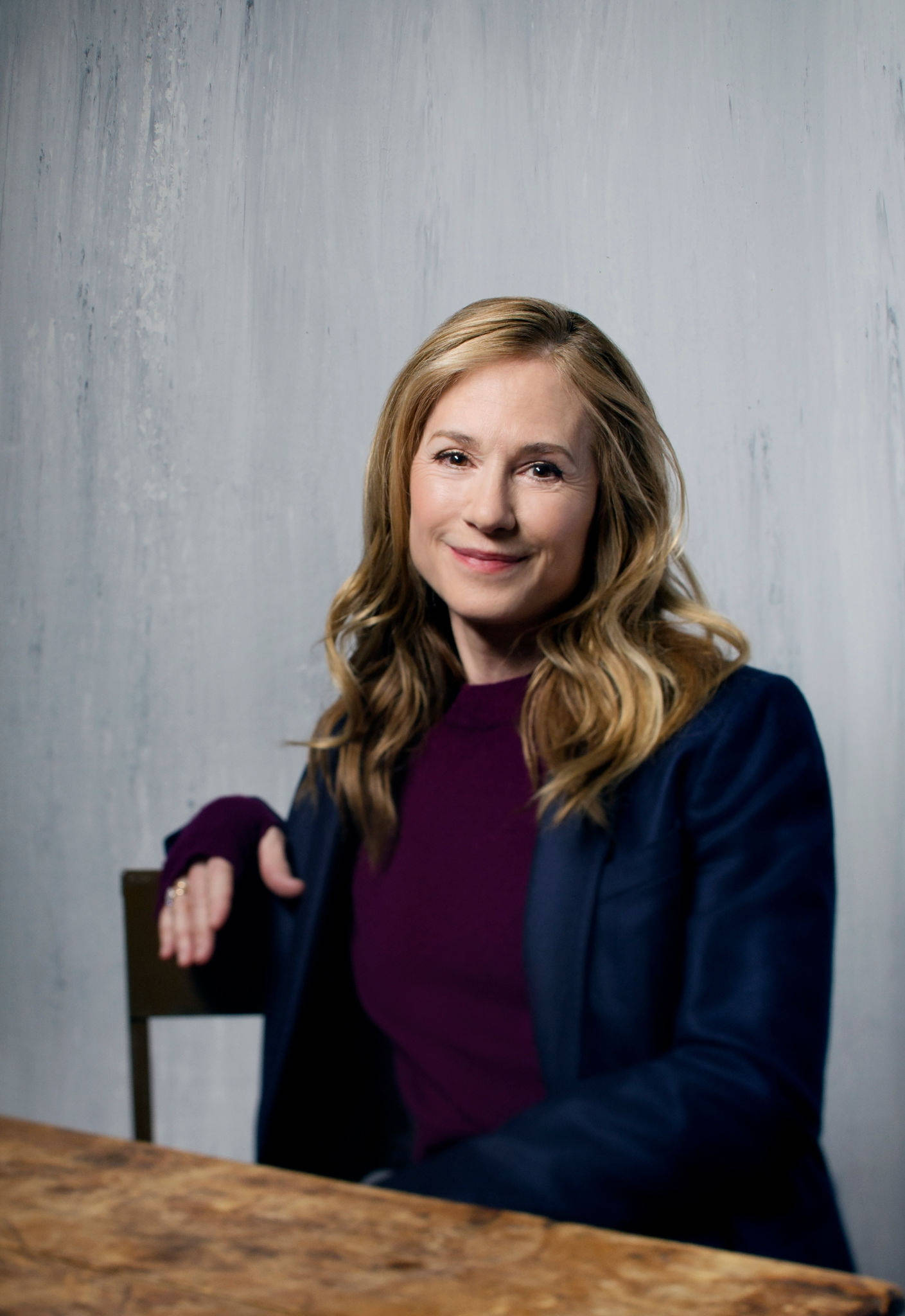 Holly Hunter, blonde hair, wooden table, Full HD Phone Wallpaper