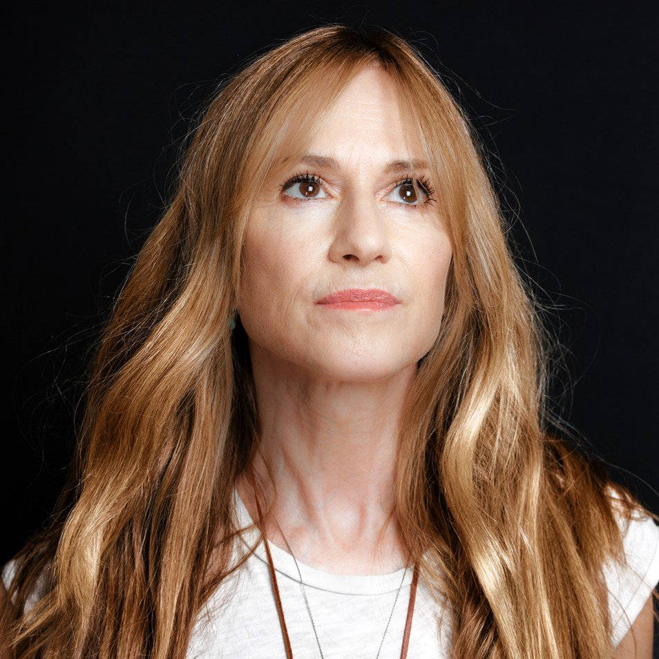 Holly Hunter, long wavy blonde hair, stark black background, SD Desktop Wallpaper
