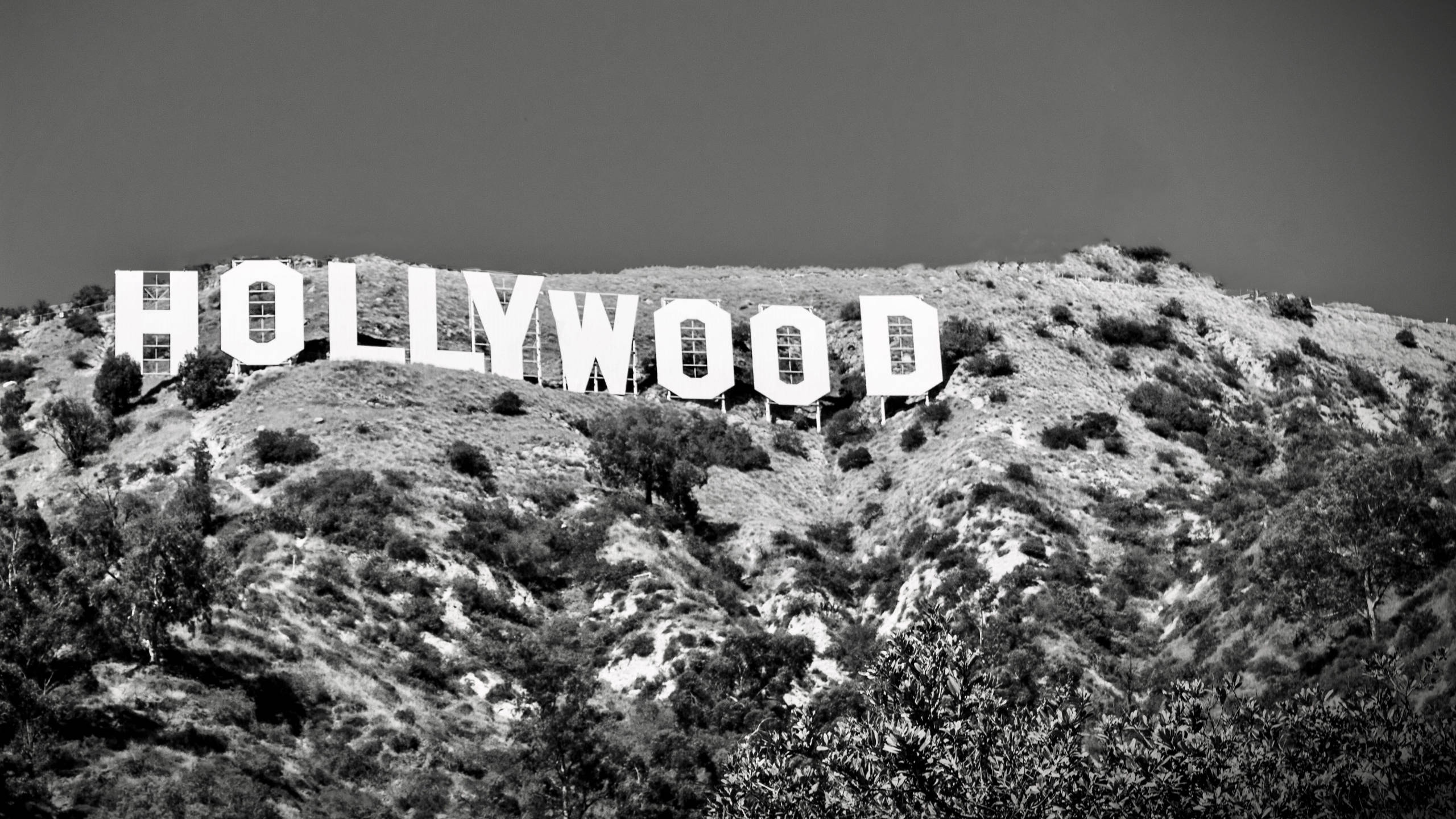 Hollywood sign, rugged hillside, scrub brush, 2K Desktop Wallpaper