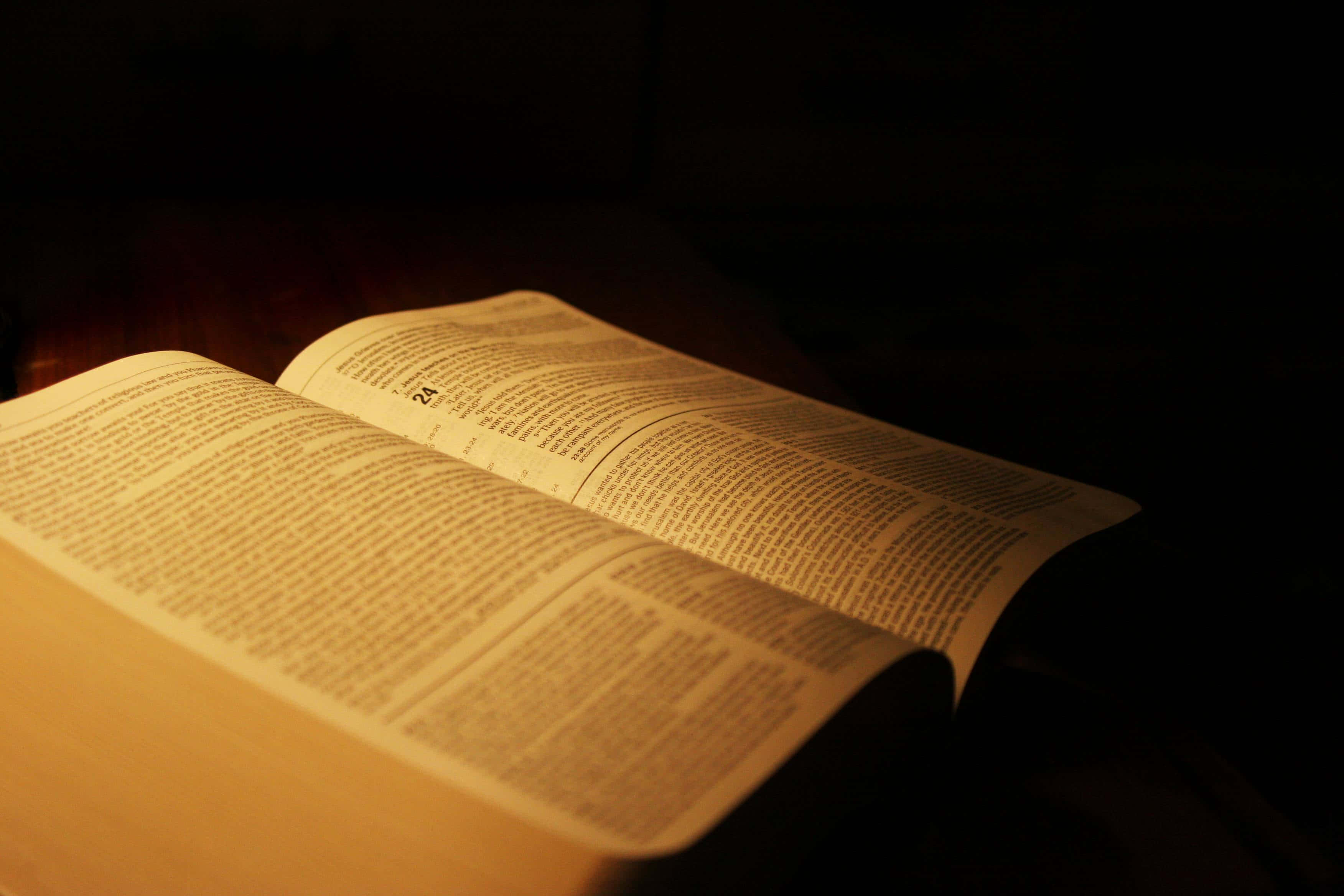 Vintage Holy Bible, open book, wooden surface, 2K Desktop Wallpaper